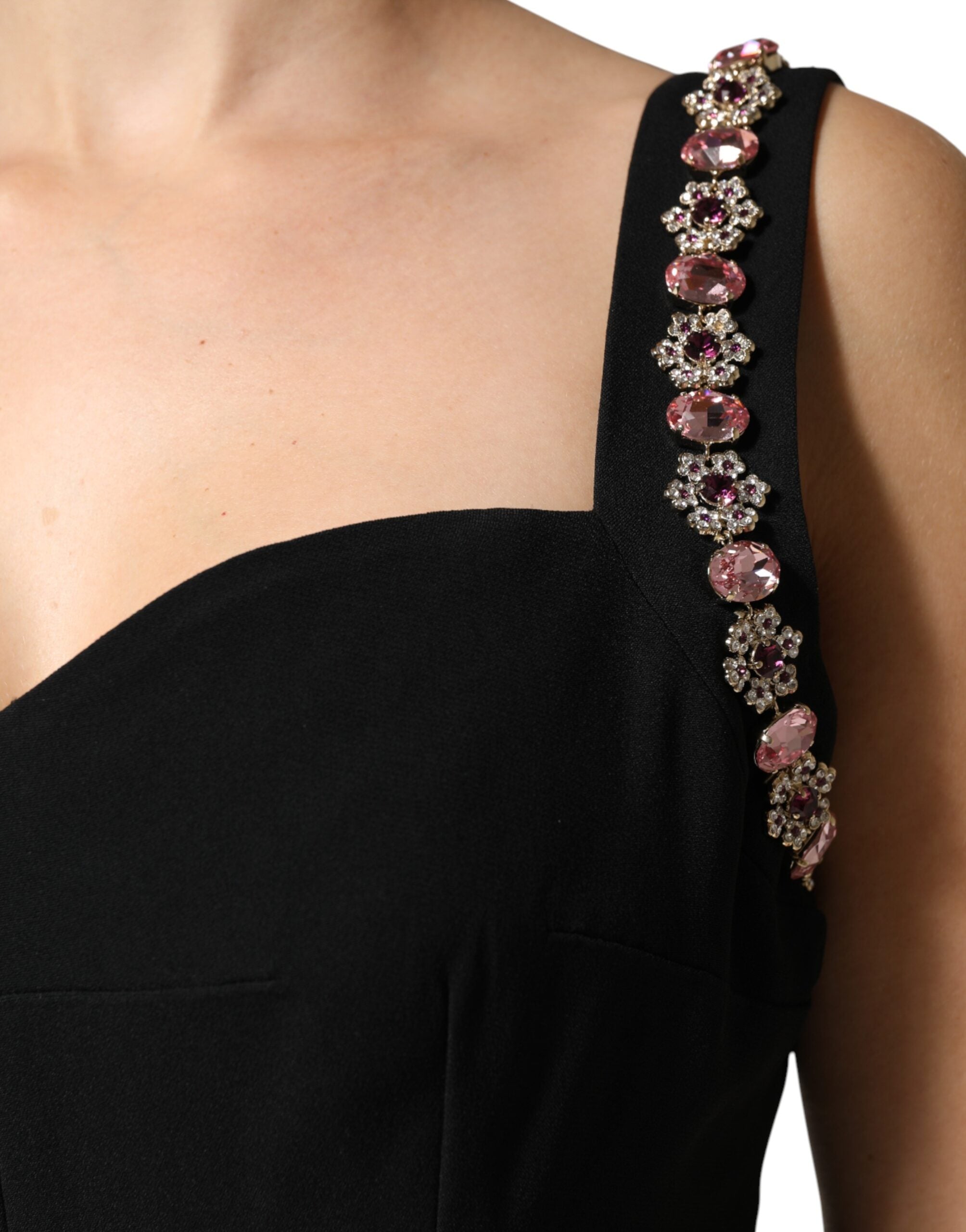 Indulge in the exquisite craftsmanship of the Dolce & Gabbana Black Embellished Bodycon Long Gown, where luxurious fabrics and alluring details celebrate your unique elegance.