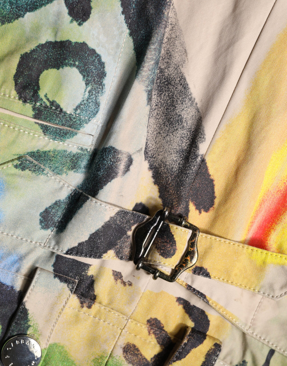Elevate your summer wardrobe with Dolce & Gabbana's Multicolor Graffiti High-Waist Bermuda Shorts, crafted from luxurious cotton, embodying urban artistry and sophistication.