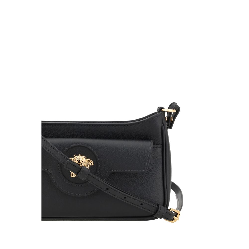 Indulge in the Versace Black Calf Leather Bos Taurus Shoulder Bag, a symbol of luxury and elegance, crafted for those who appreciate exquisite craftsmanship and timeless style.