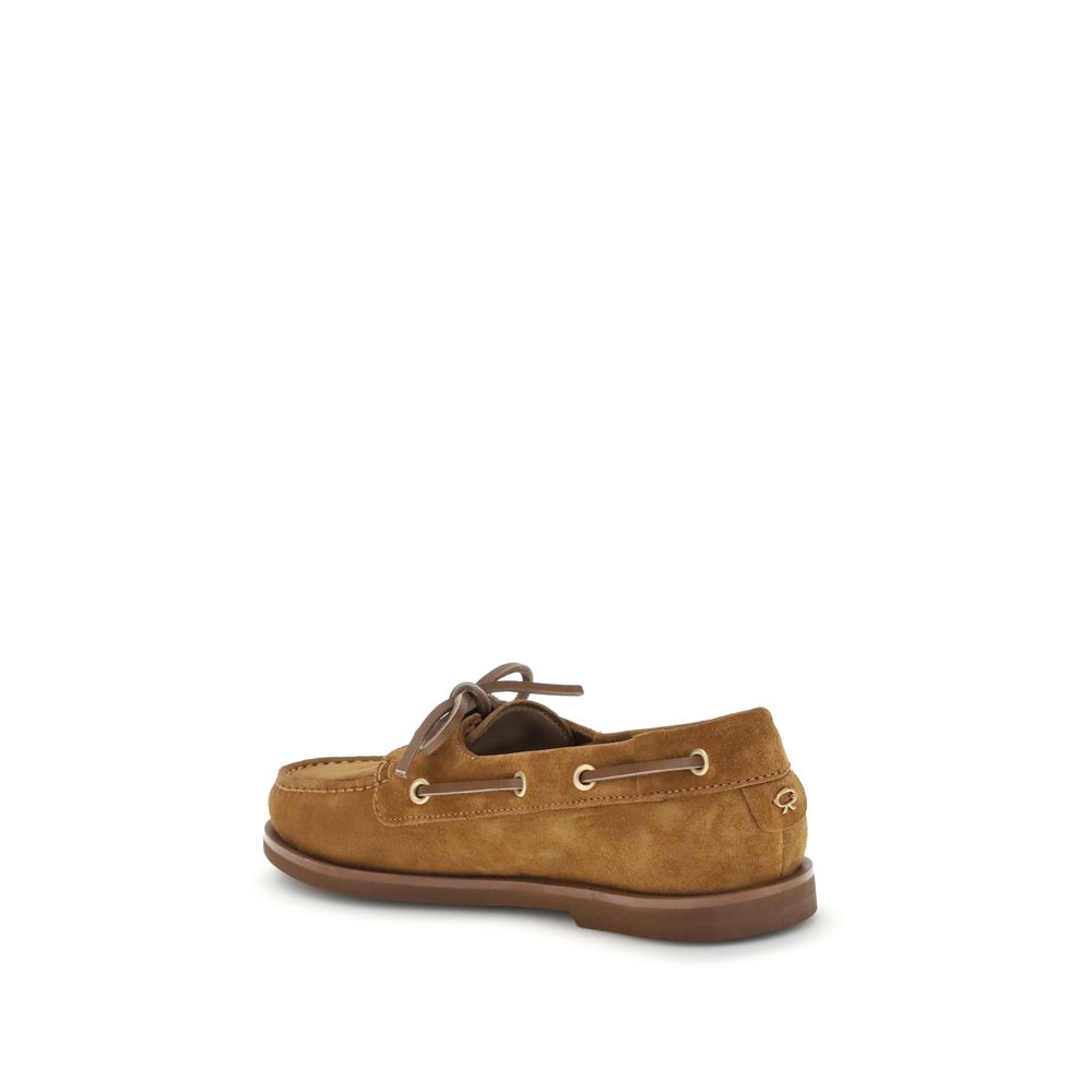 Indulge in the Gianvito Rossi Brown Calf Leather Bos Taurus Slip-On Loafers, a masterpiece of luxury craftsmanship that elevates your style with effortless elegance.