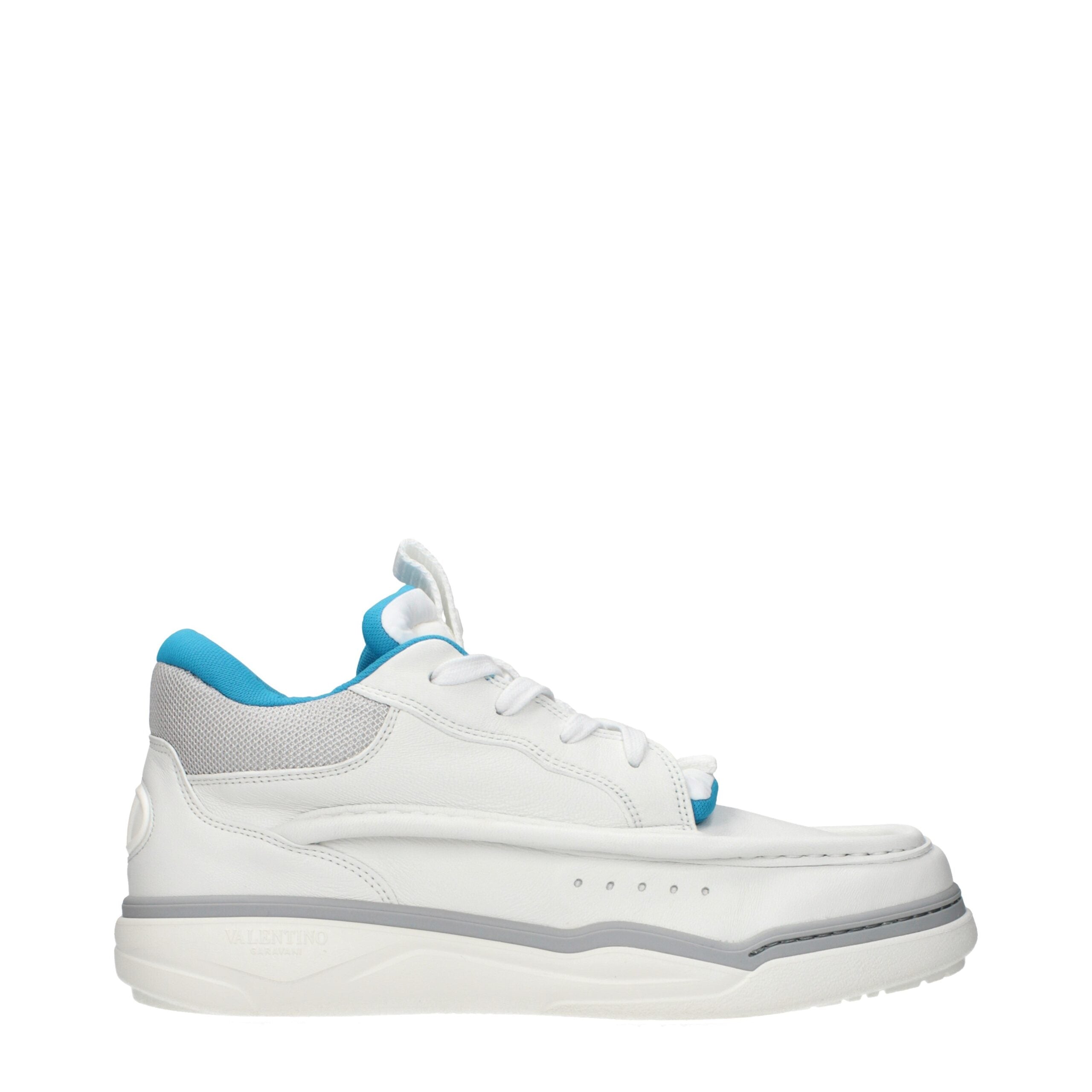 Indulge in the exquisite craftsmanship of Valentino Garavani White Leather Low Top Sneakers, where refined elegance meets modern sophistication for the discerning fashion connoisseur.