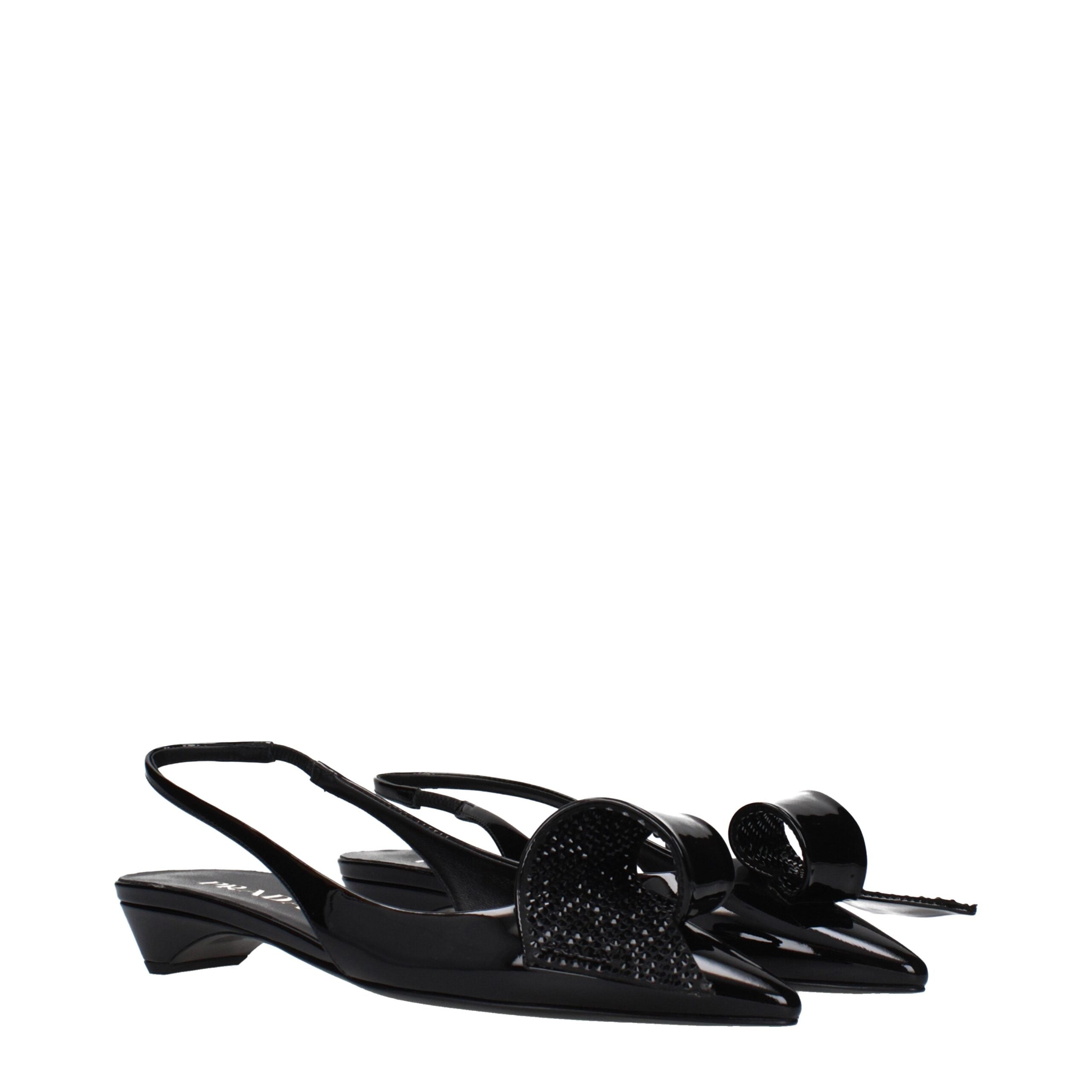 Step into sophistication with Prada Black Leather Flat Sandals, where exquisite patent leather meets meticulous craftsmanship, perfect for elevating any occasion.