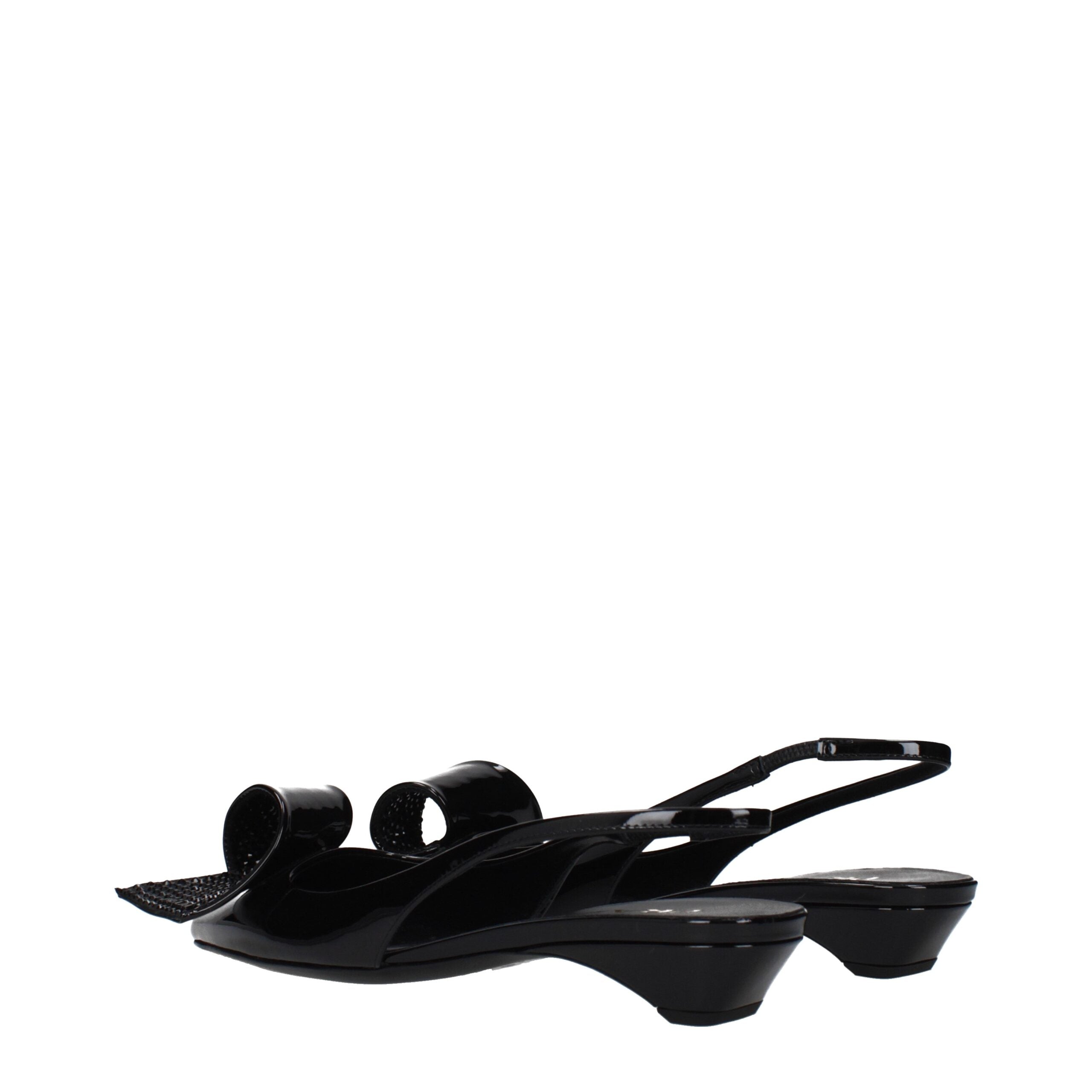Experience the allure of Prada Black Leather Flat Sandals, crafted from premium patent leather, blending elegance and comfort for the discerning individual.
