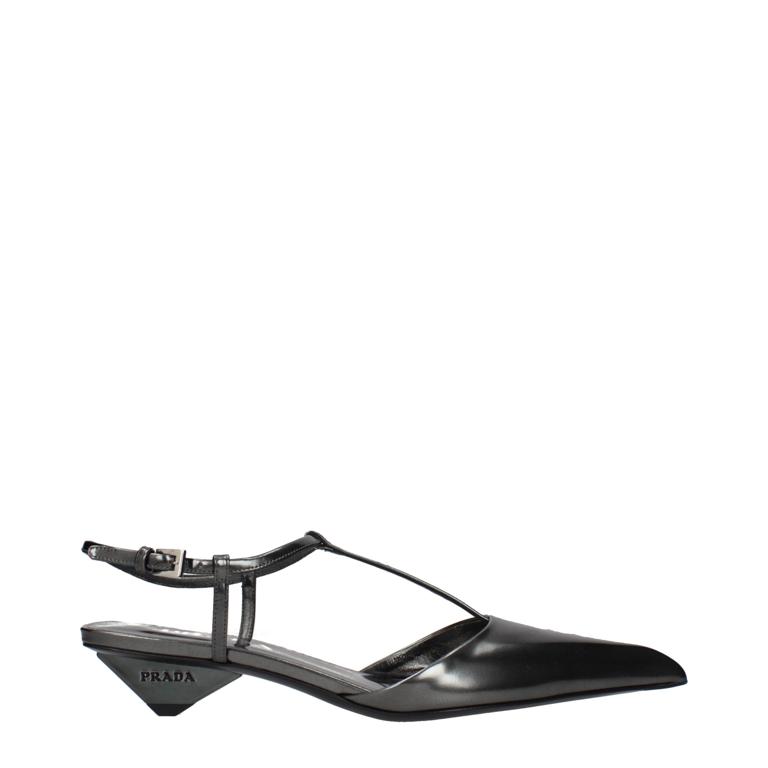 Indulge in the Prada Gray Leather Flat Sandals, where exquisite craftsmanship meets timeless luxury, perfect for elevating any sophisticated ensemble.