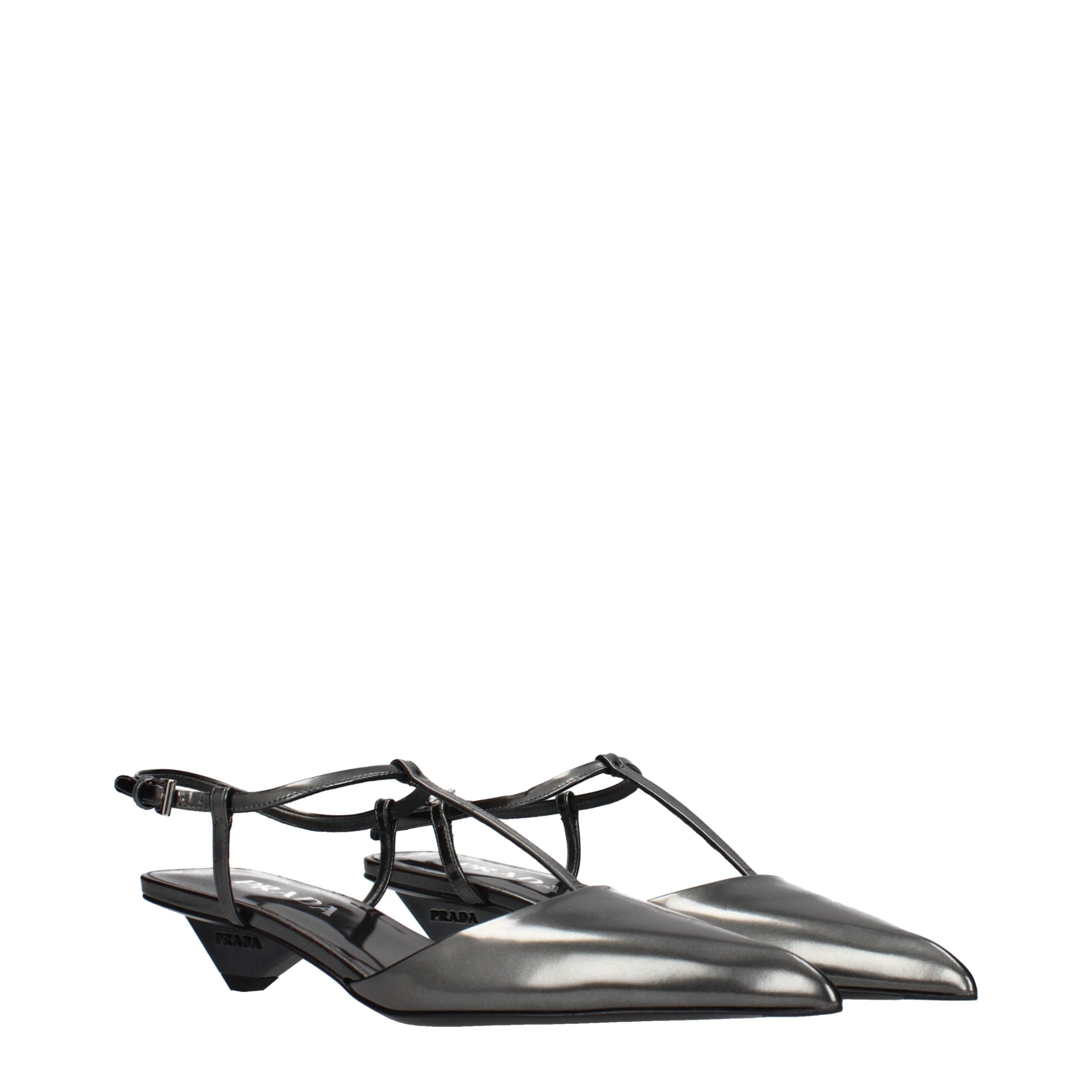 Experience the essence of sophistication with Prada Gray Leather Flat Sandals, where premium craftsmanship meets timeless elegance for every discerning occasion.