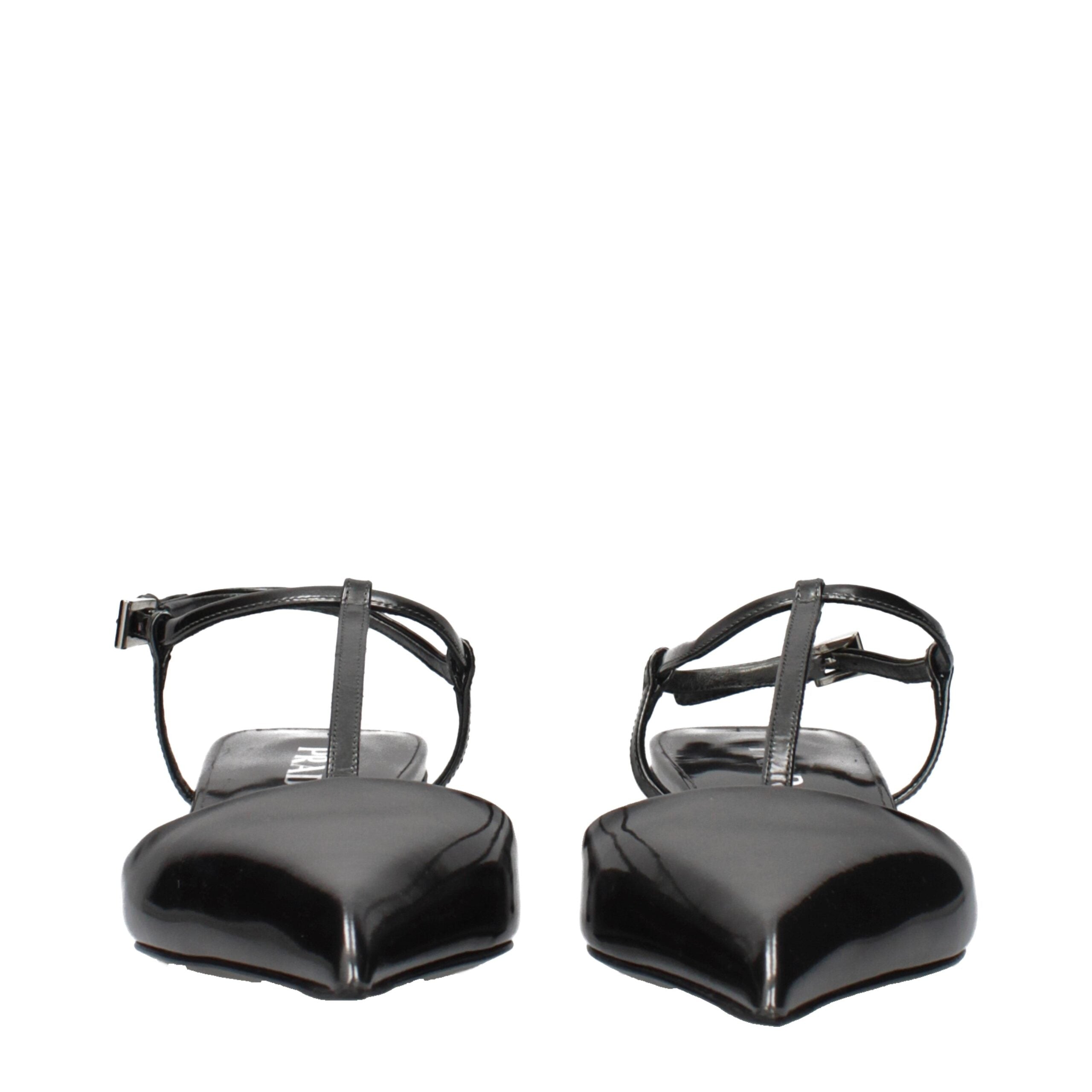 Experience the allure of Prada Gray Leather Flat Sandals, where premium craftsmanship meets timeless elegance, perfect for the discerning individual seeking sophistication.