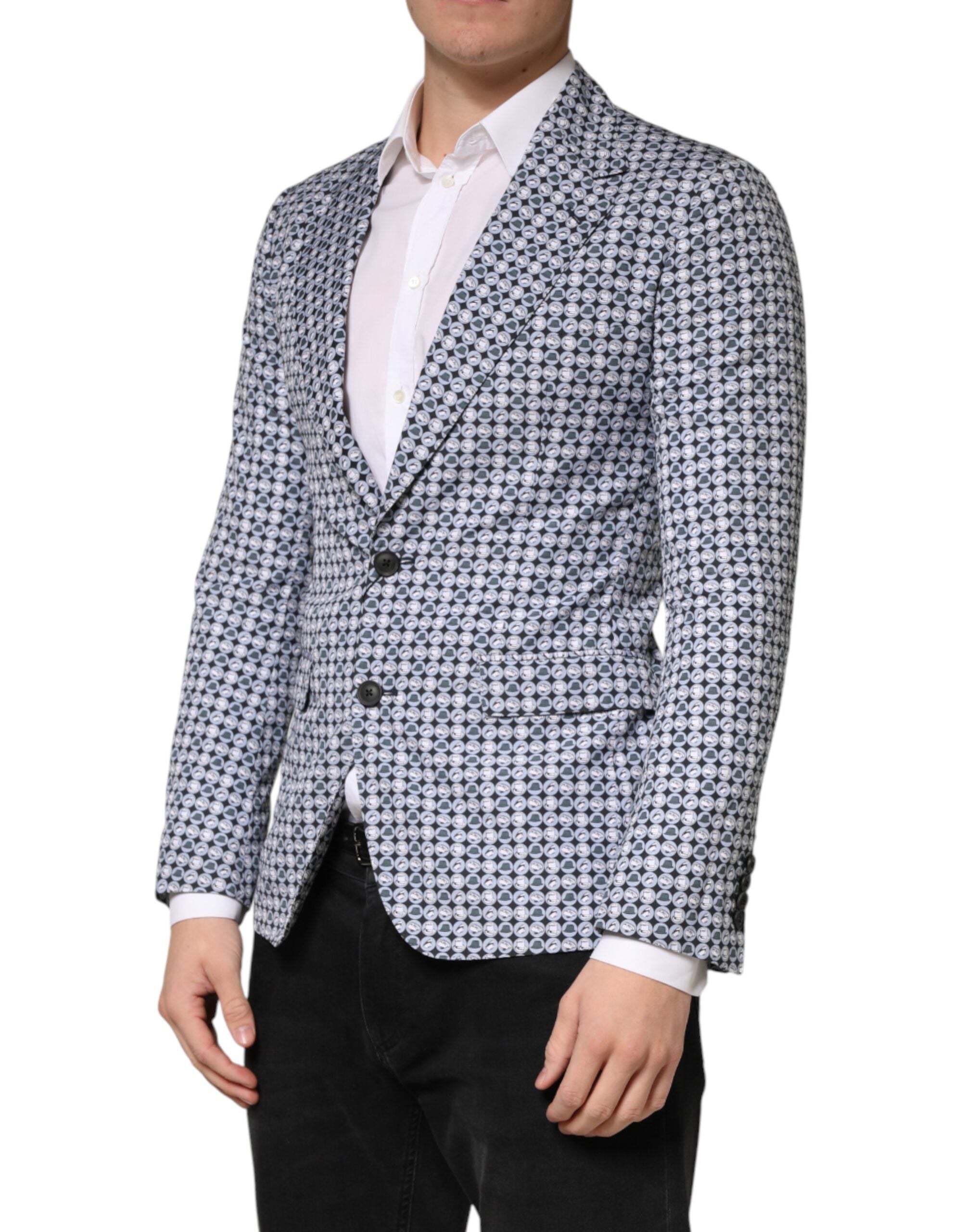 Discover the Dolce & Gabbana Blue Cotton Patterned Single Breasted Blazer, a masterpiece of Italian craftsmanship, blending luxurious materials with timeless elegance for the discerning individual.