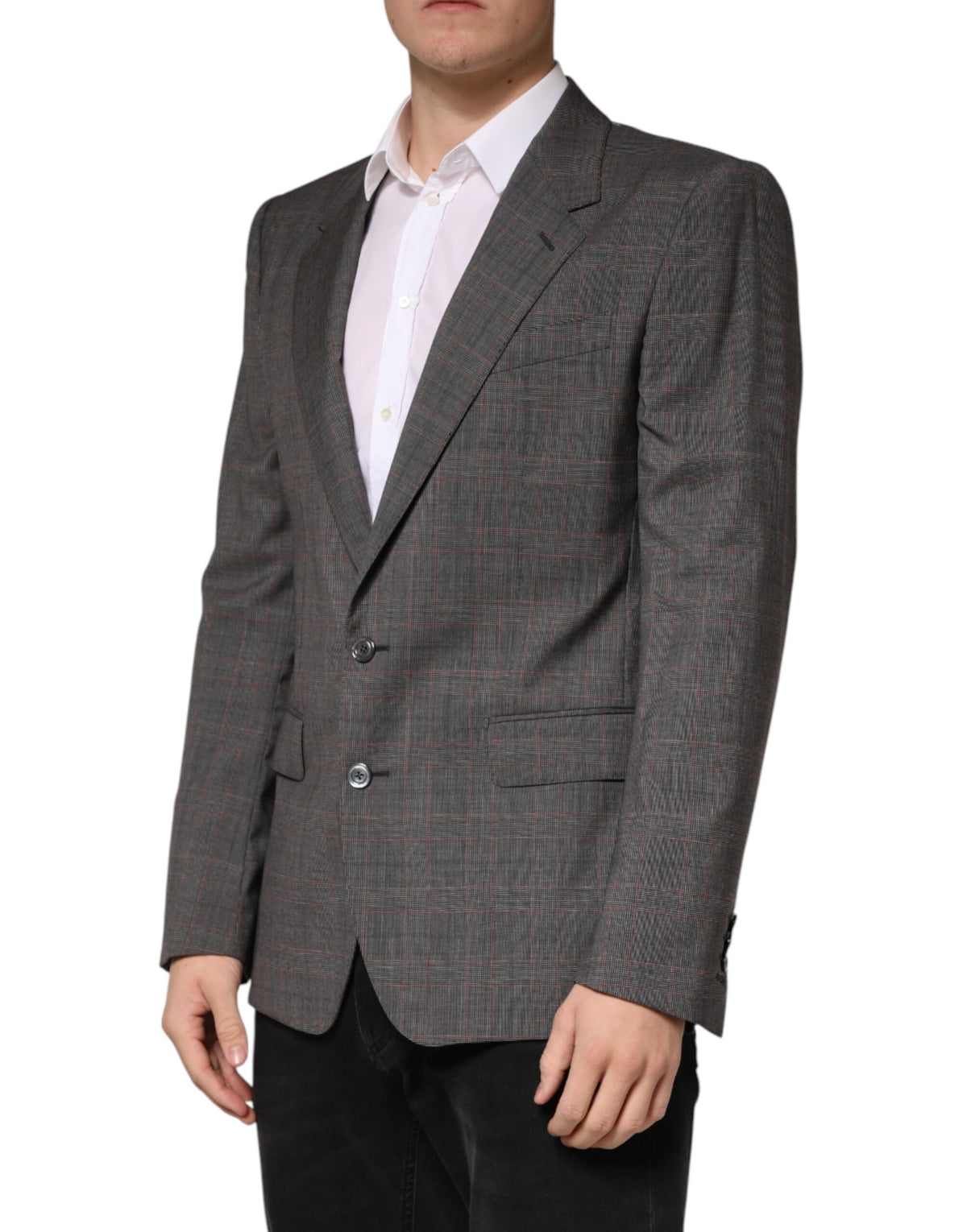 Elevate your wardrobe with the Dolce & Gabbana Gray Wool Blazer, a masterpiece of Italian craftsmanship in luxurious virgin wool, perfect for sophisticated occasions.