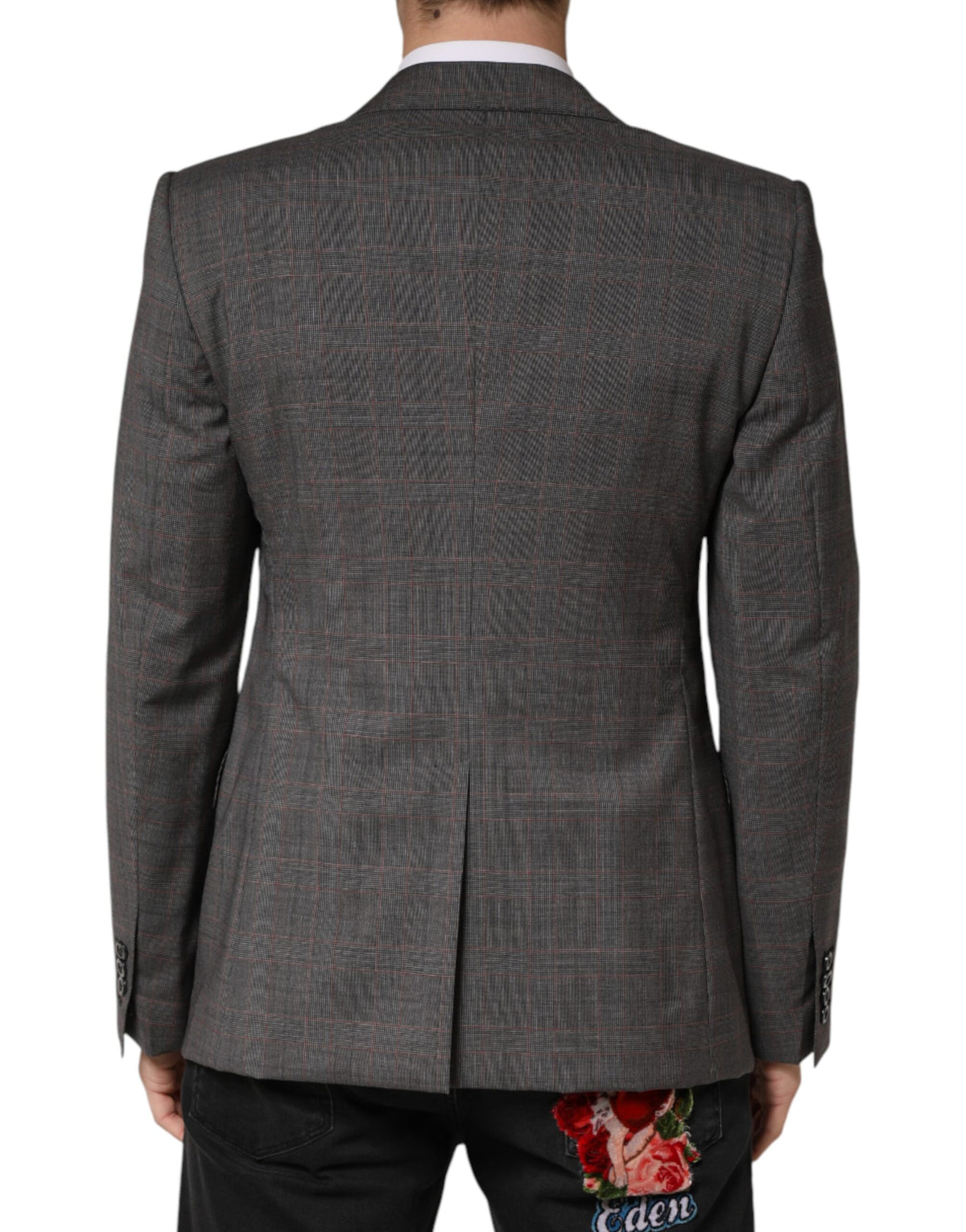 Elevate your wardrobe with the Dolce & Gabbana Gray Wool Blazer, a masterpiece of Italian craftsmanship in luxurious virgin wool, perfect for the discerning individual.