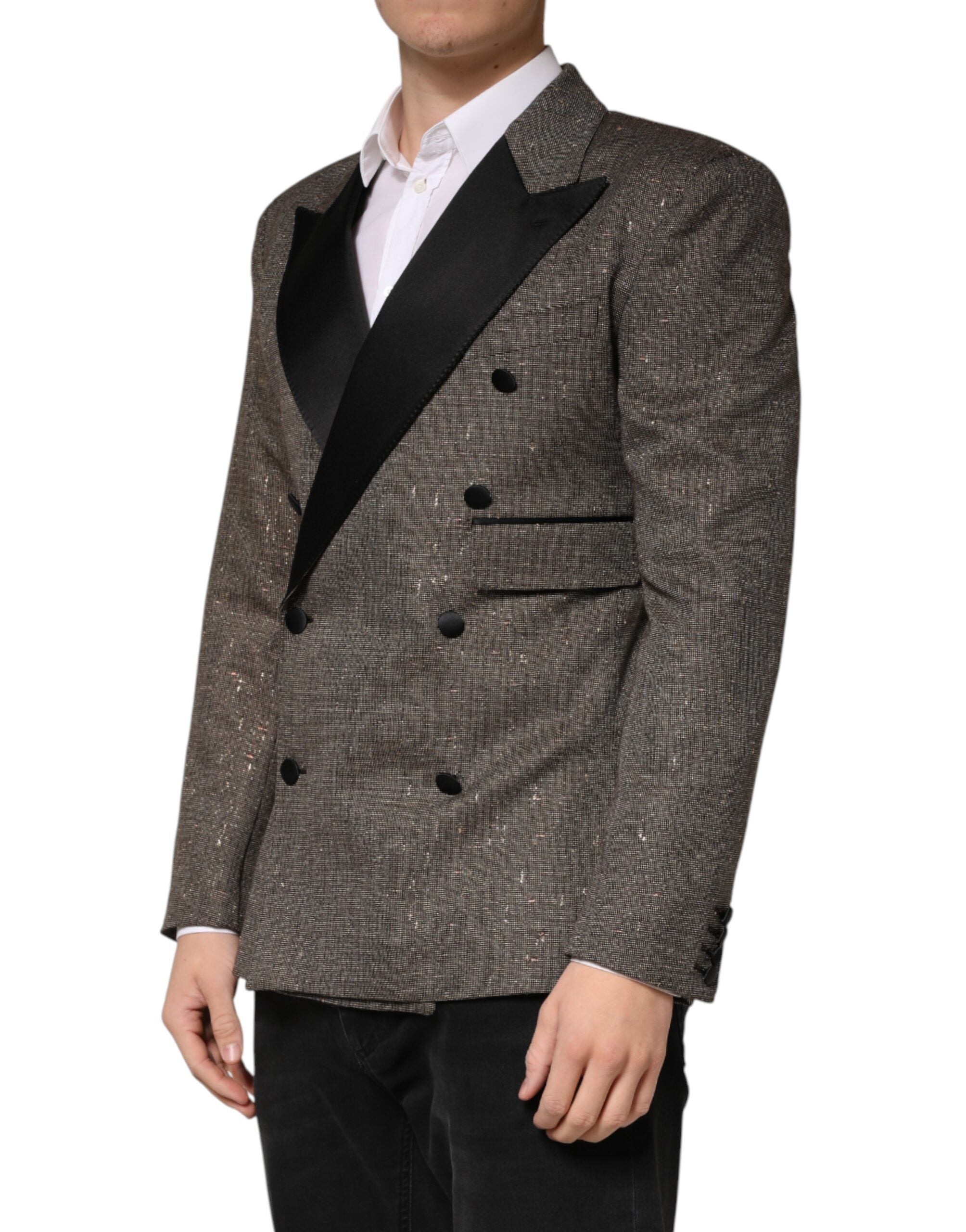 Elevate your style with the Dolce & Gabbana Gray Double Breasted Blazer, a masterpiece of Italian craftsmanship that embodies timeless elegance and sophistication.