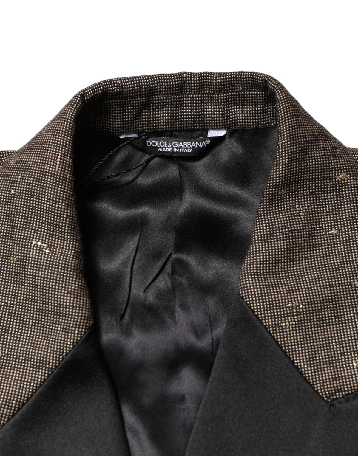 Experience the exquisite luxury of the Dolce & Gabbana Gray Double Breasted Blazer, crafted in Italy with premium wool, perfect for sophisticated occasions and timeless elegance.