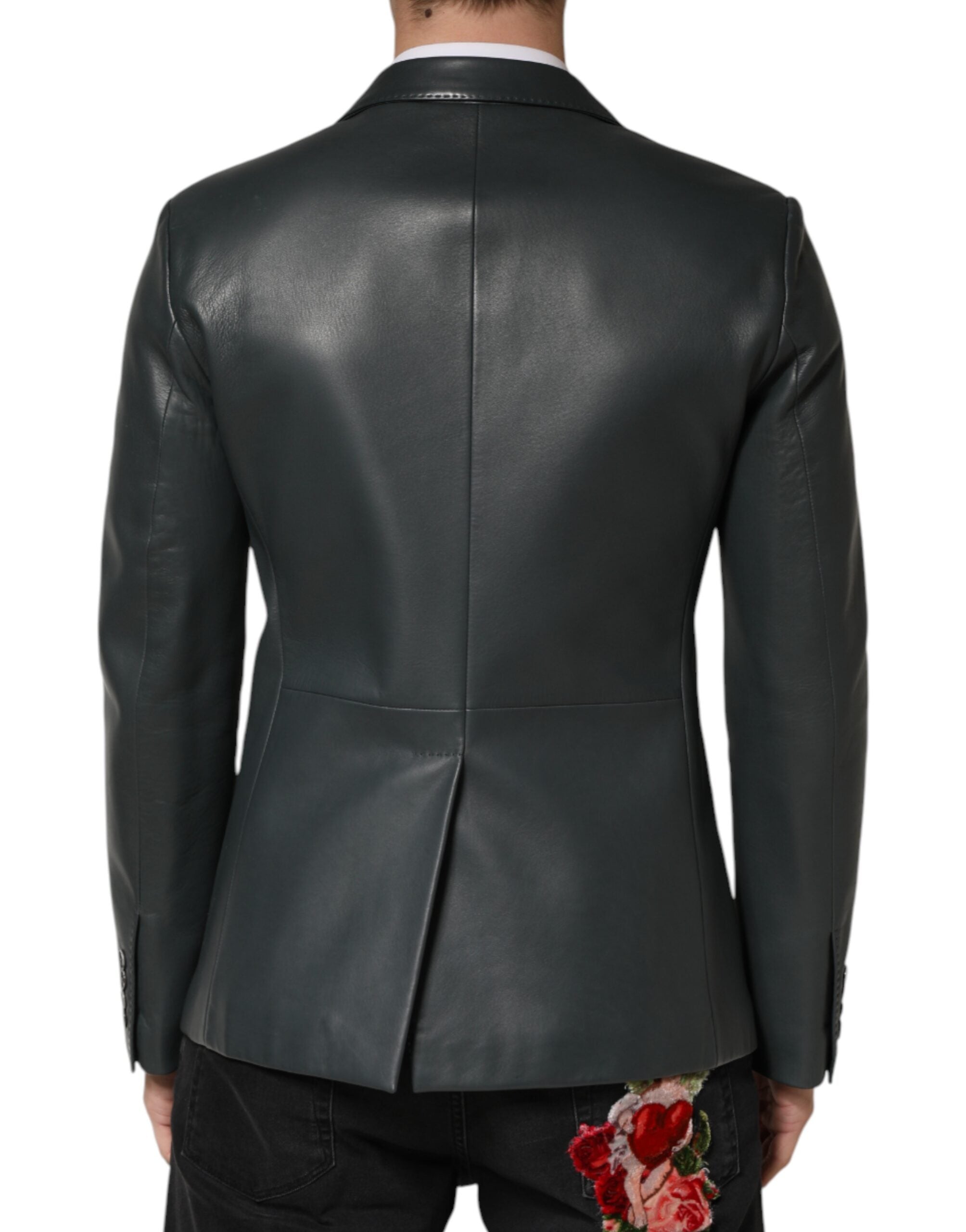 Experience the allure of the Dolce & Gabbana Black Leather Double Breasted Blazer, a testament to Italian craftsmanship and luxury, perfect for the discerning individual.