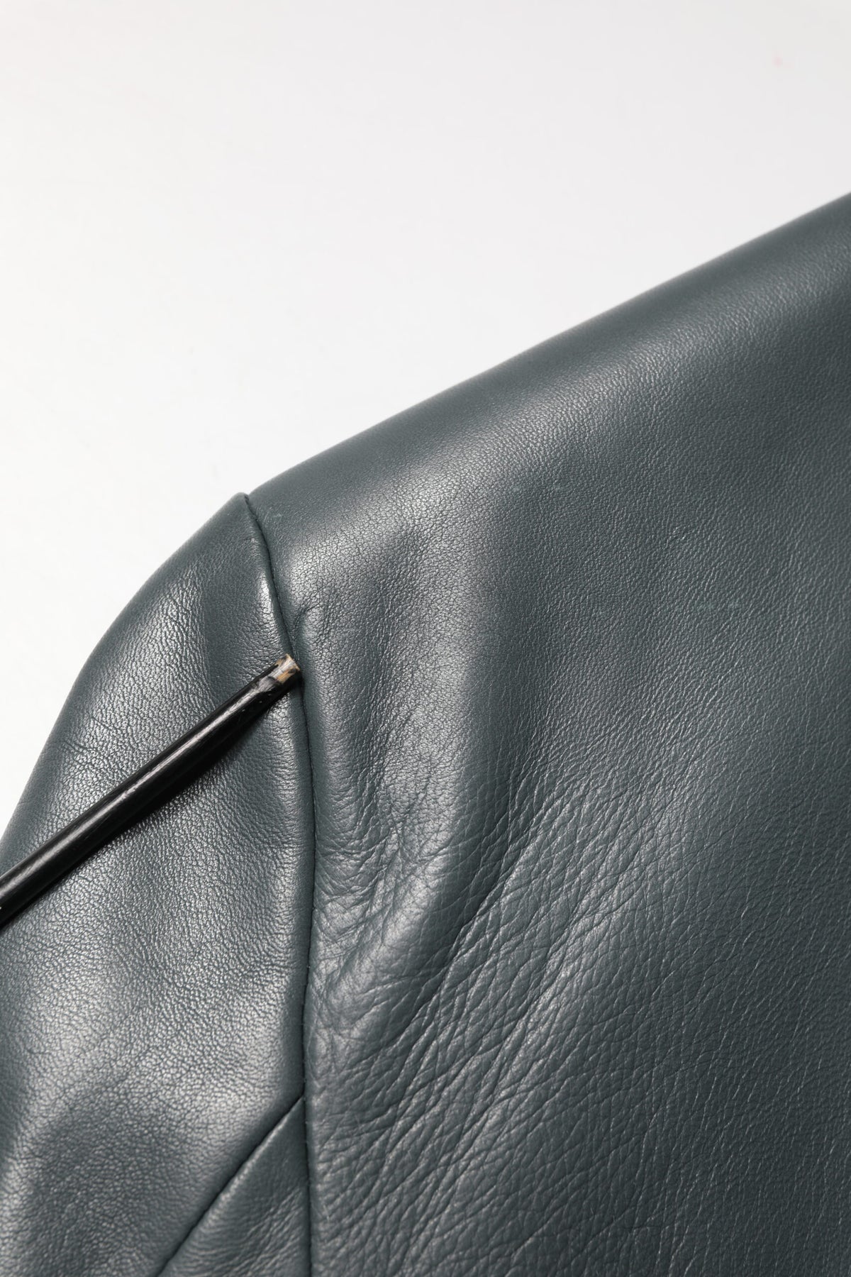Experience the allure of Dolce & Gabbana's Black Leather Double Breasted Blazer, a symbol of Italian craftsmanship and timeless elegance, perfect for sophisticated occasions.