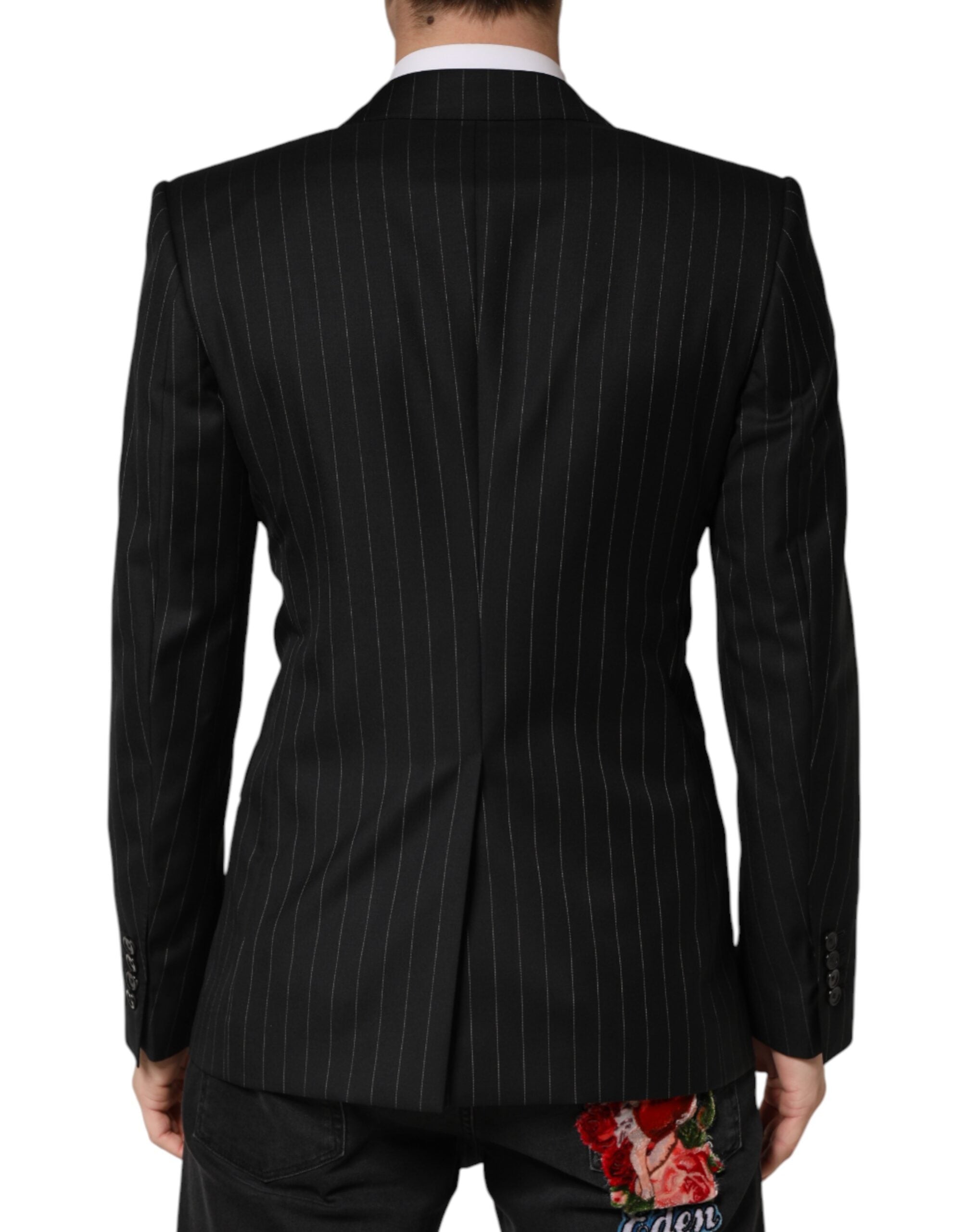 Elevate your style with the Dolce & Gabbana Black Stripes Double Breasted Blazer, crafted from luxurious virgin wool and silk lining, embodying timeless Italian elegance.