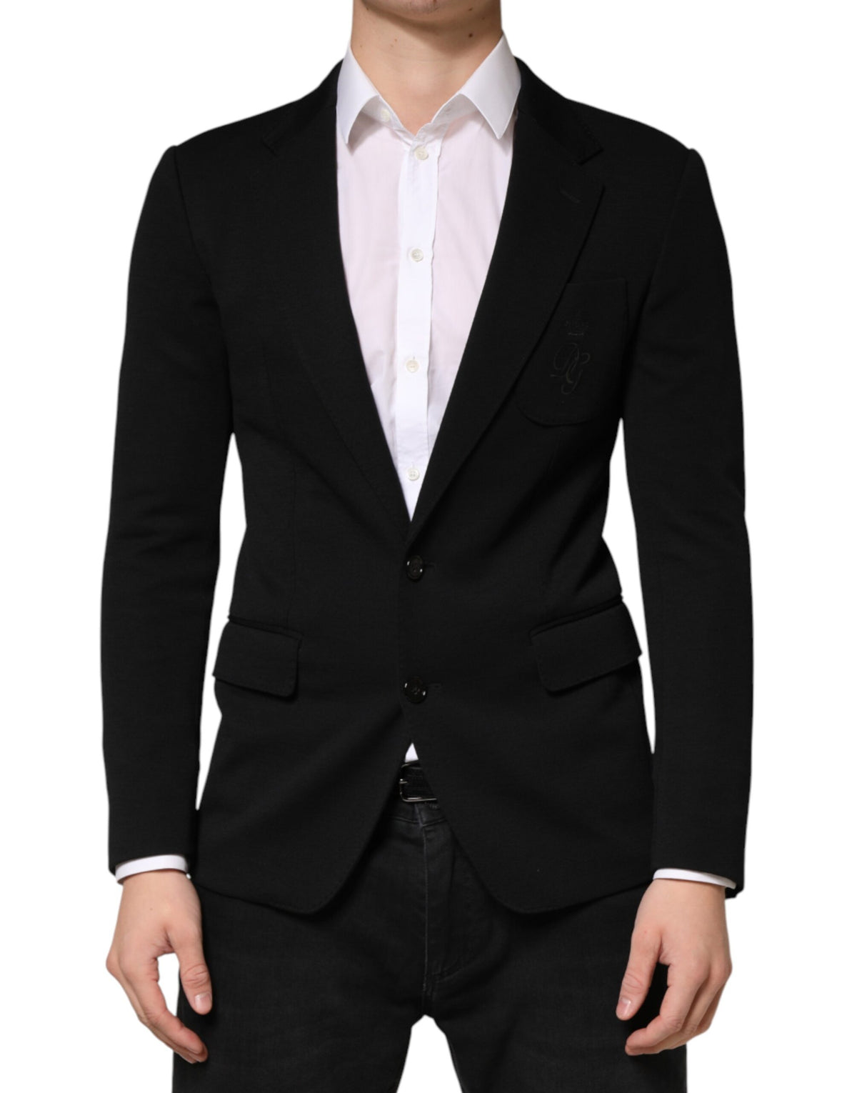 Elevate your wardrobe with the Dolce & Gabbana Black Wool Single Breasted Blazer, a timeless Italian masterpiece crafted for those who embody elegance and sophistication.