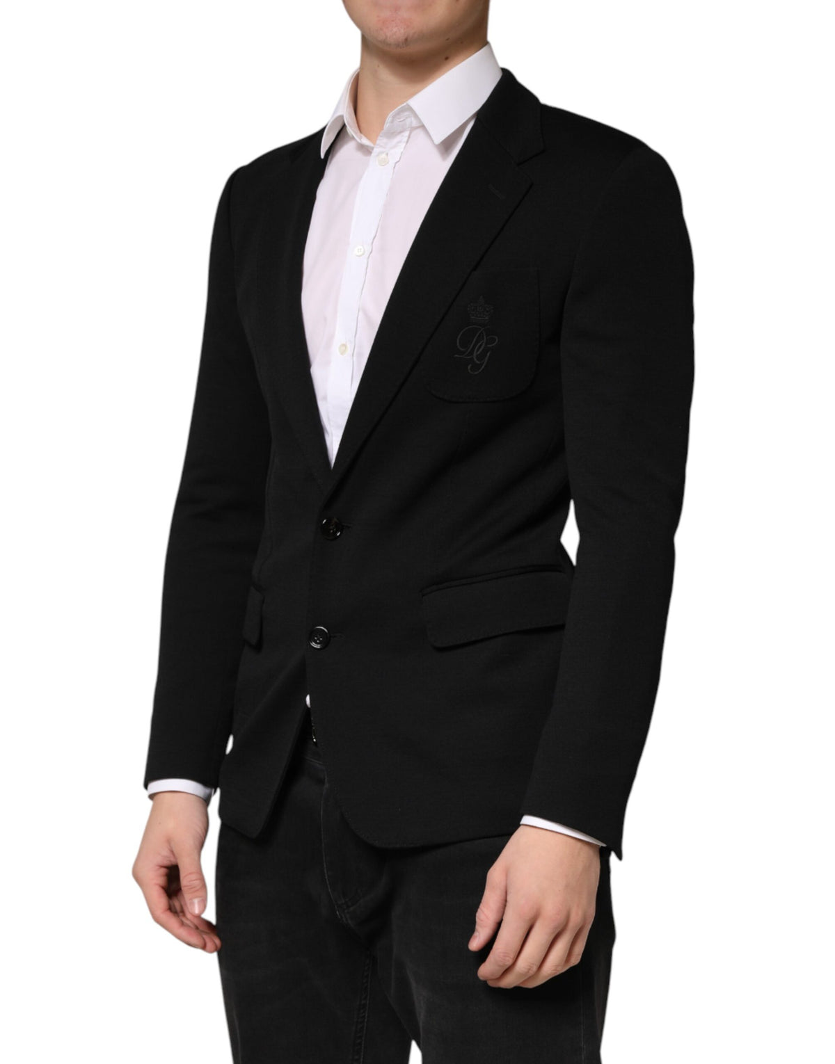 Indulge in the exquisite Dolce & Gabbana Black Wool Single Breasted Blazer, a timeless Italian masterpiece crafted for those who embody elegance and authority.
