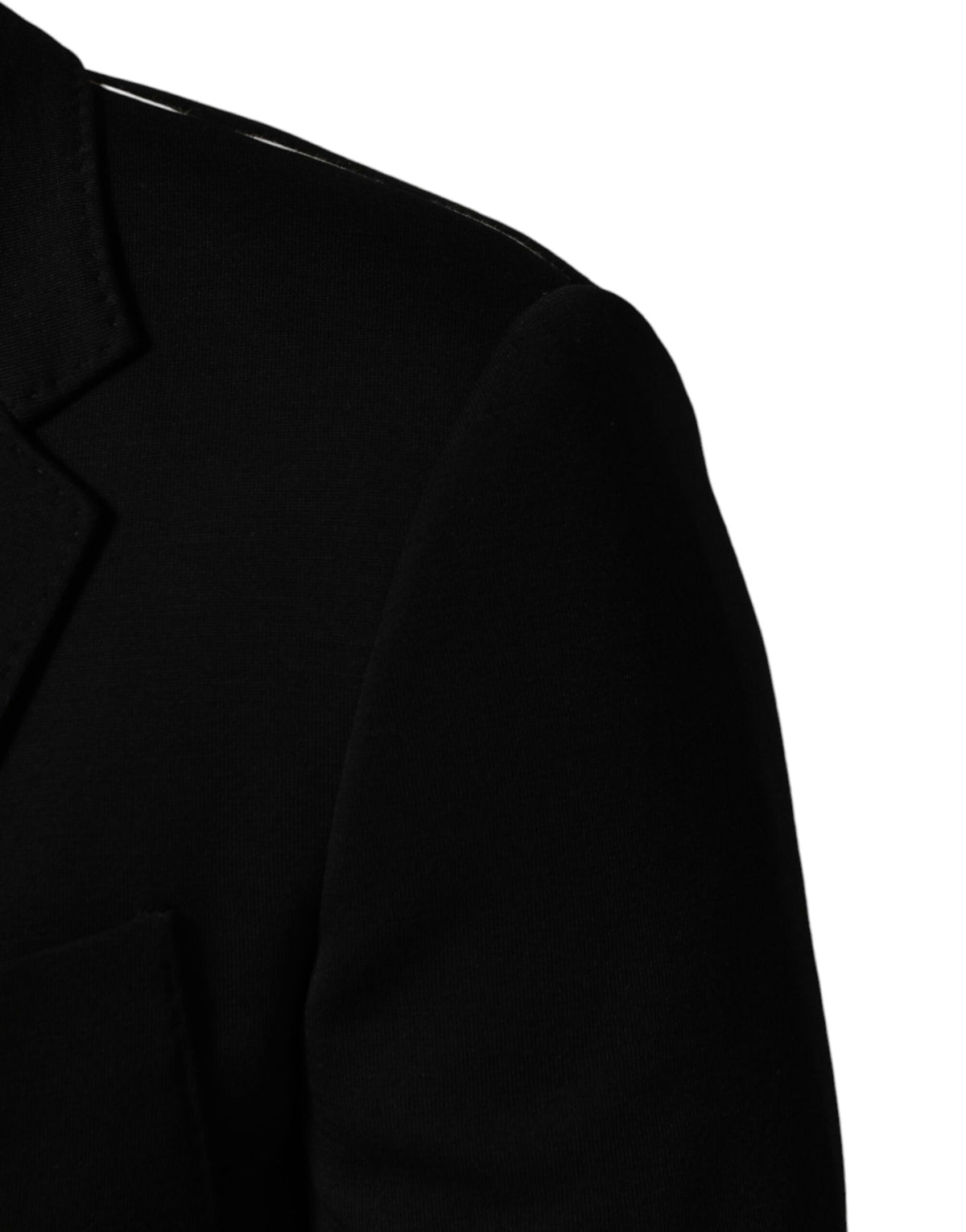 Indulge in the exquisite craftsmanship of the Dolce & Gabbana Black Wool Blazer, a timeless piece that embodies luxury and sophistication for discerning individuals.