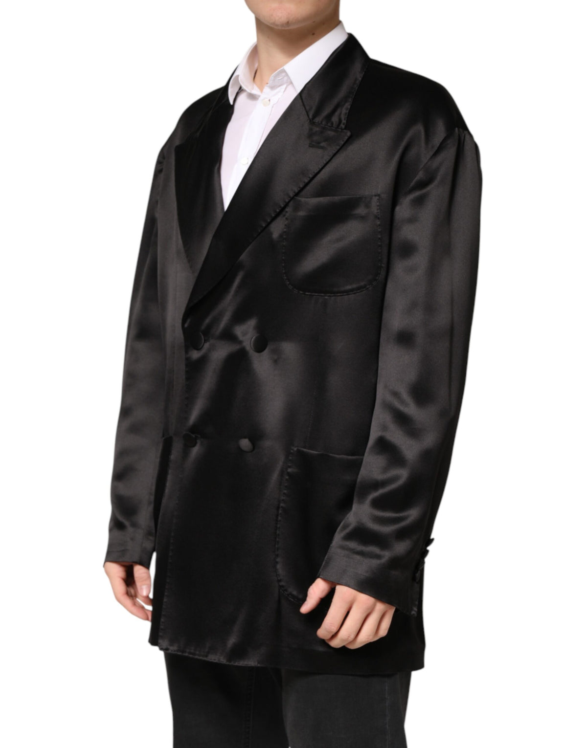 Elevate your style with the Dolce & Gabbana Black Silk Double Breasted Blazer, a testament to Italian craftsmanship that embodies sophistication and timeless elegance.