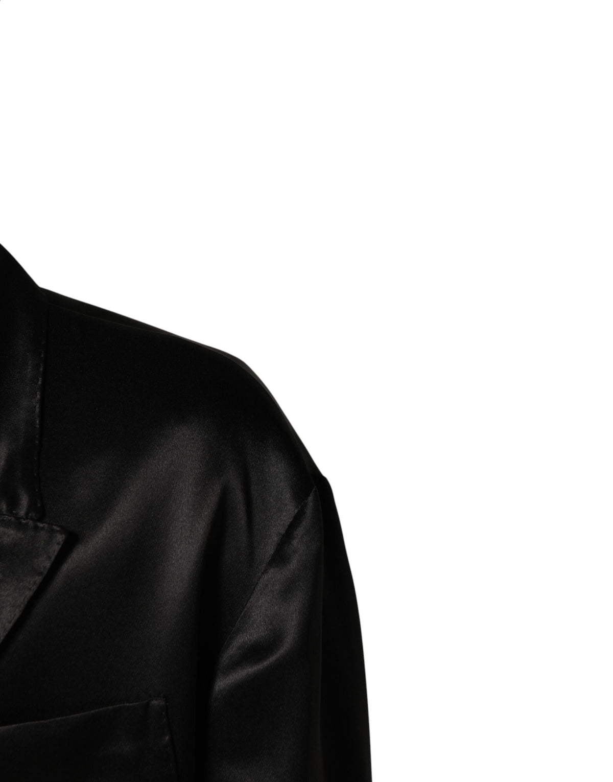Elevate your style with the Dolce & Gabbana Black Silk Double Breasted Blazer, a testament to Italian craftsmanship that embodies timeless elegance and sophistication.