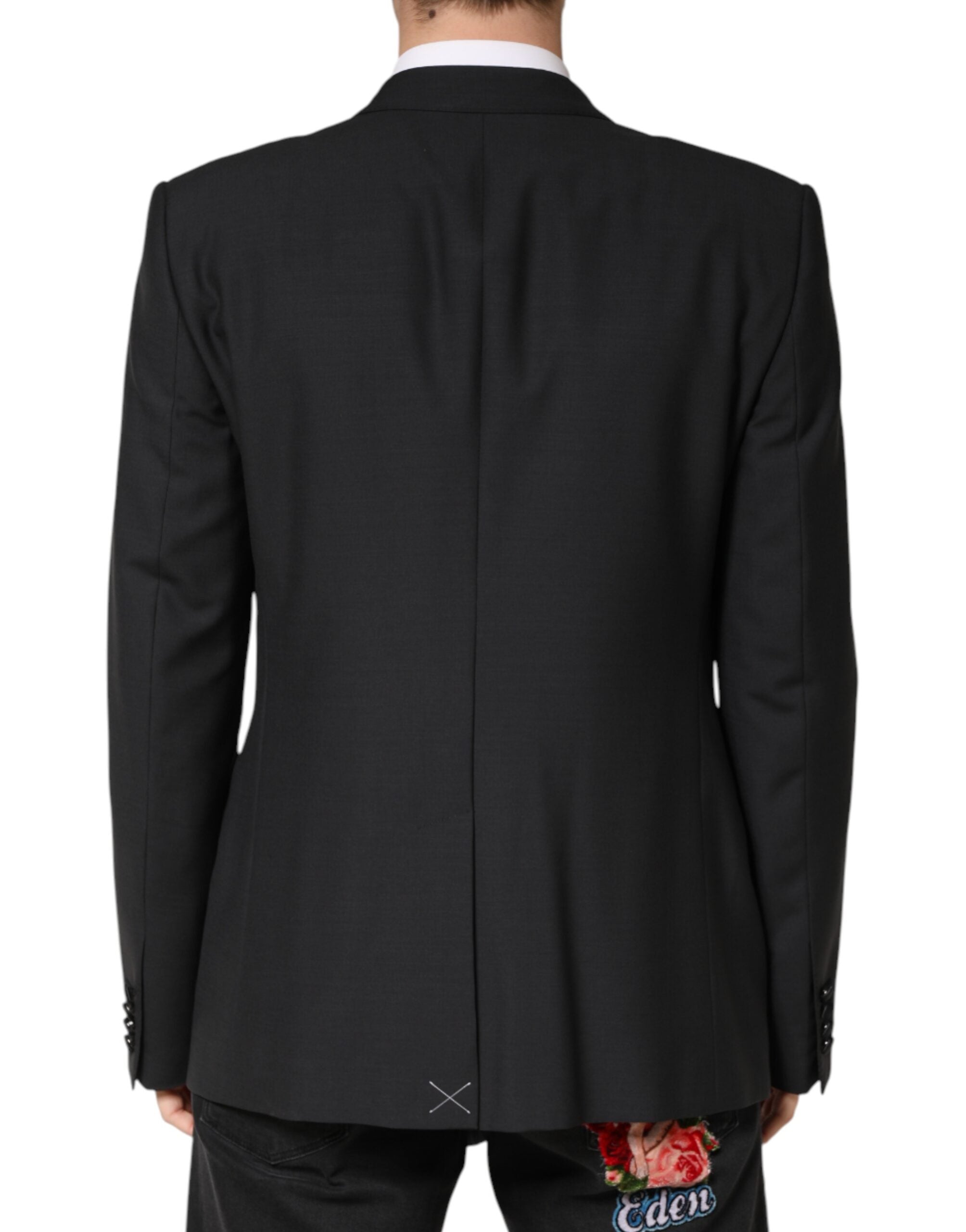 Indulge in the exquisite Dolce & Gabbana Black MARTINI Blazer, crafted from luxurious virgin wool and silk, embodying timeless Italian sophistication for the discerning individual.