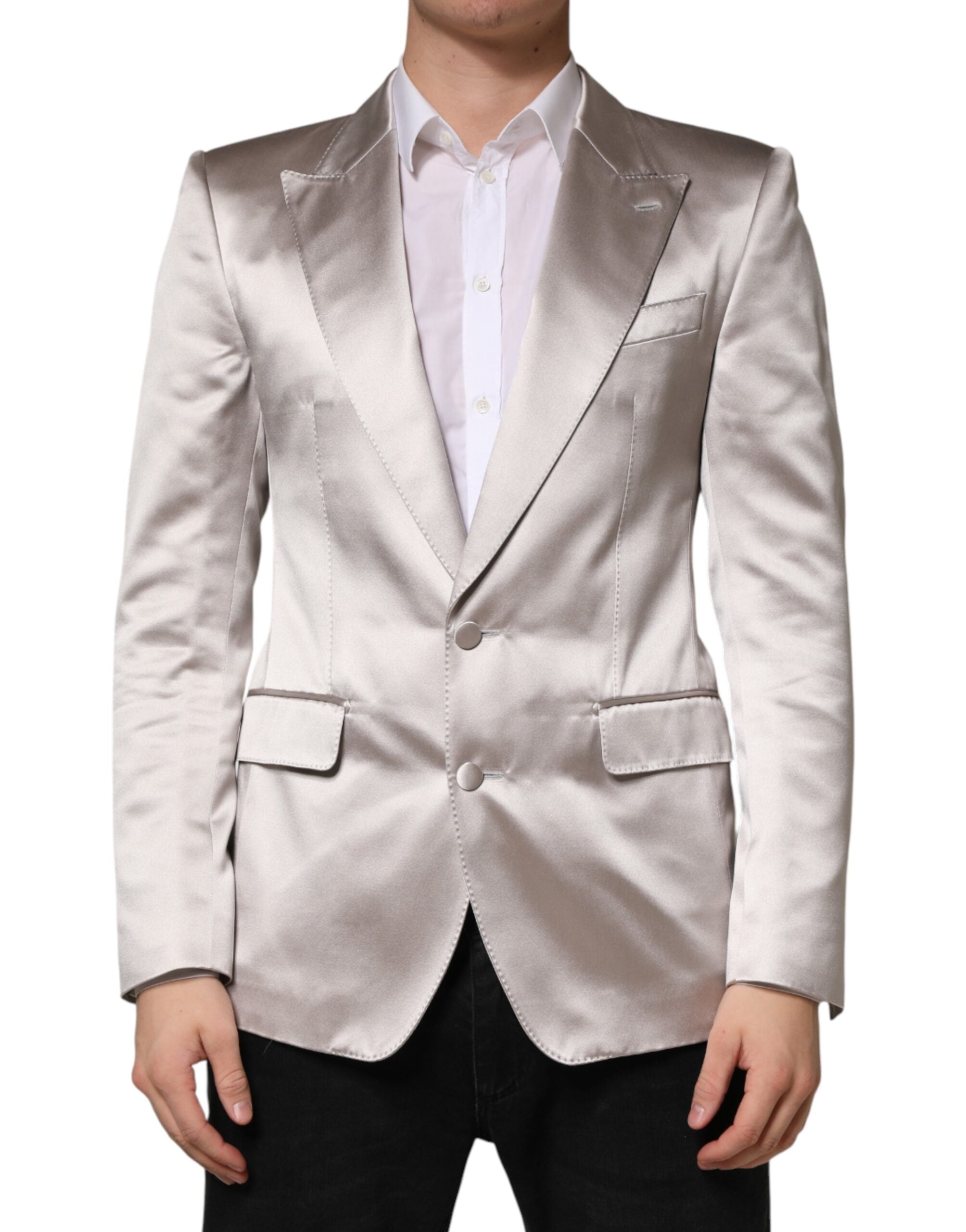 Elevate your wardrobe with the Dolce & Gabbana Silver SICILIA Blazer, a luxurious silk masterpiece that embodies timeless elegance and Italian craftsmanship for the discerning individual.