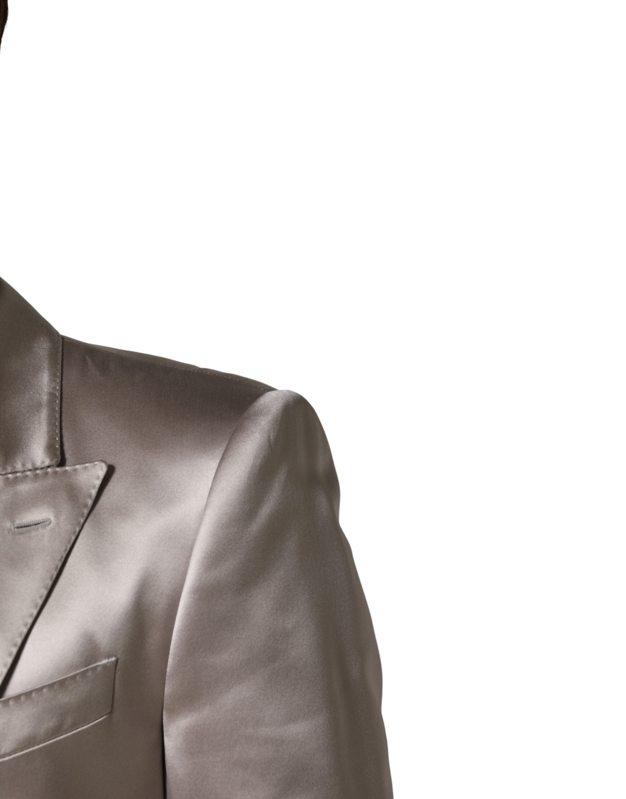 Elevate your wardrobe with the Dolce & Gabbana Silver SICILIA Blazer, a masterpiece of silk craftsmanship that embodies timeless elegance and sophisticated allure.