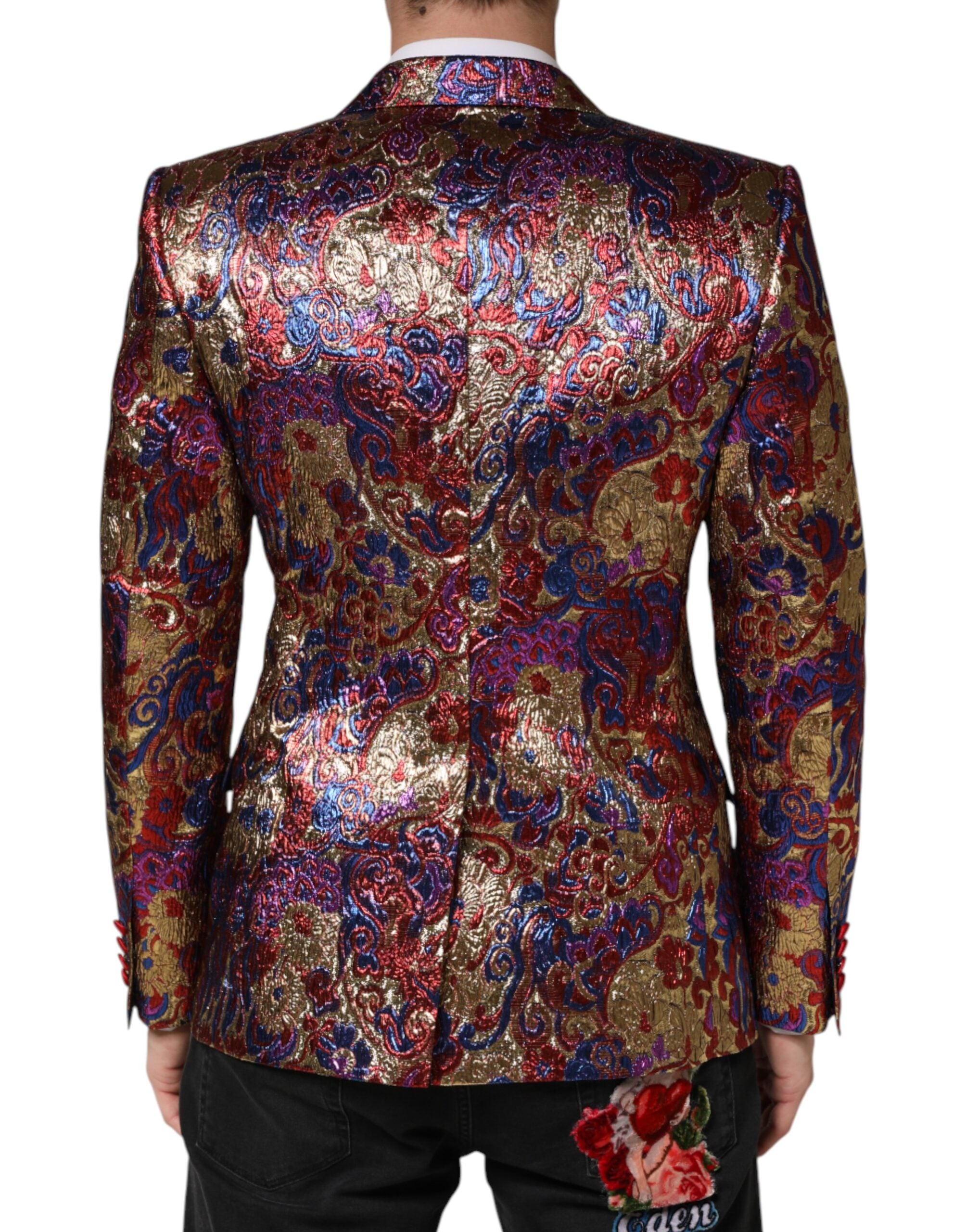 Elevate your wardrobe with the Dolce & Gabbana Multicolor Jacquard Blazer, a masterpiece of Italian craftsmanship that embodies timeless sophistication and modern elegance.