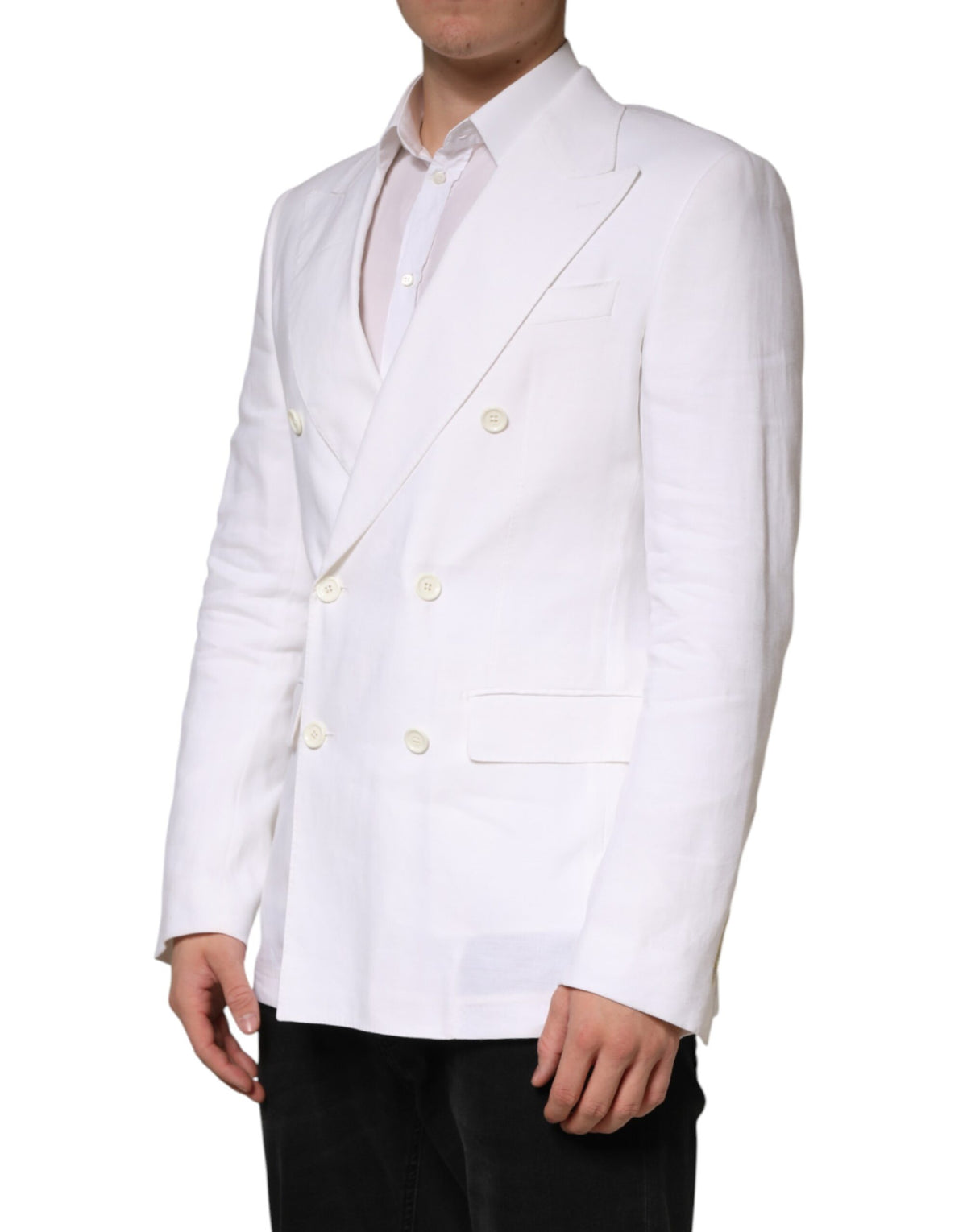 Elevate your wardrobe with the Dolce & Gabbana White Linen Double Breasted Blazer, a masterpiece of Italian craftsmanship that embodies timeless elegance and sophisticated allure.