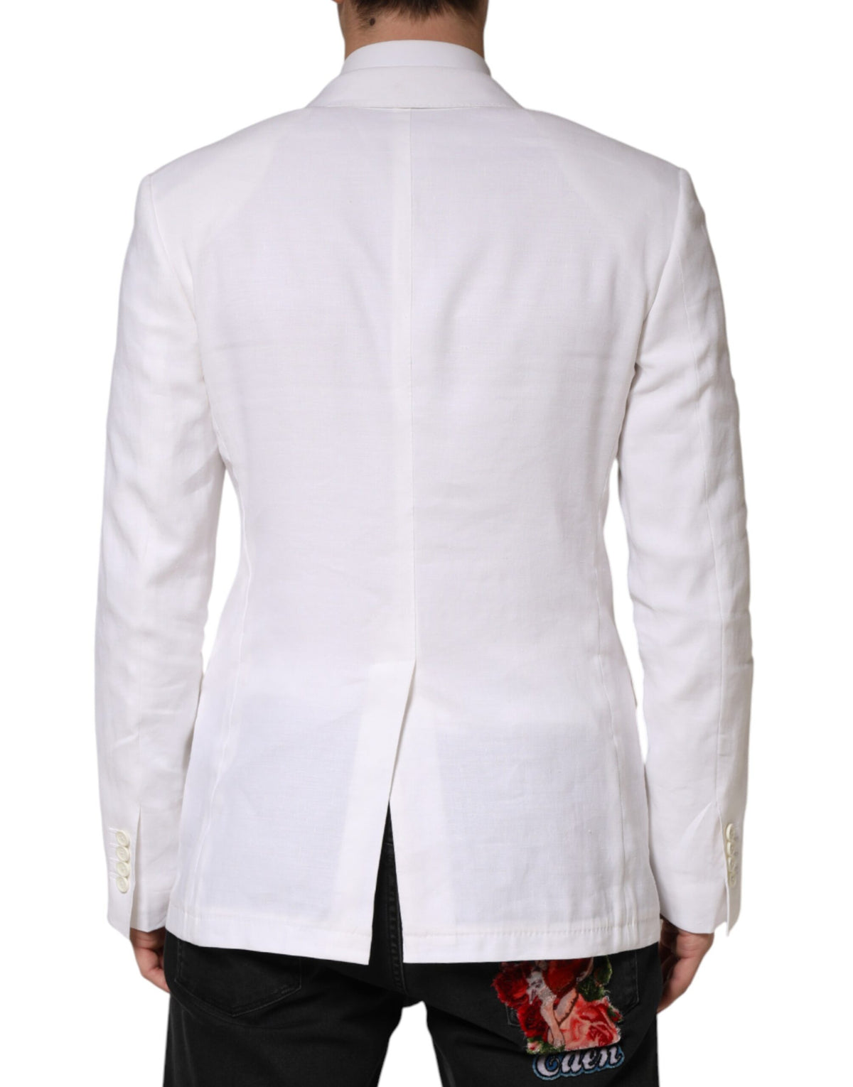 Elevate your wardrobe with the Dolce & Gabbana White Linen Double Breasted Blazer, a timeless masterpiece of Italian craftsmanship, exuding sophistication and allure.