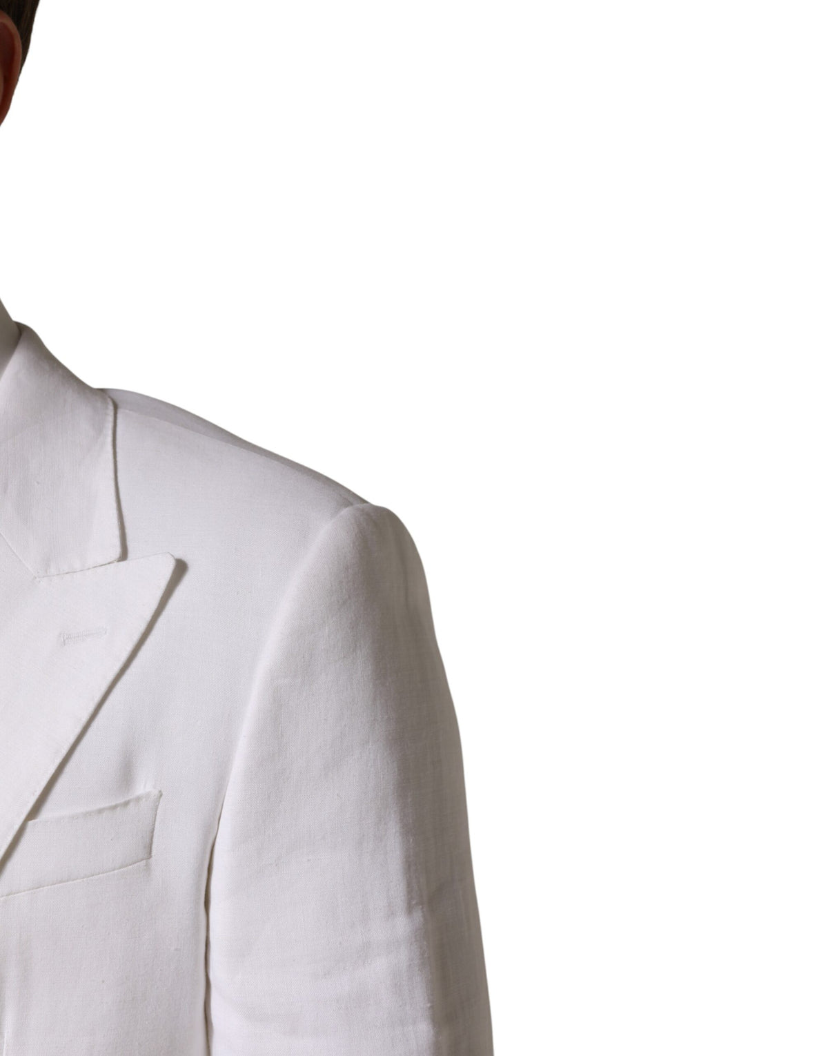 Elevate your wardrobe with the Dolce & Gabbana White Linen Double Breasted Blazer, a masterpiece of Italian craftsmanship that embodies timeless elegance and sophistication.