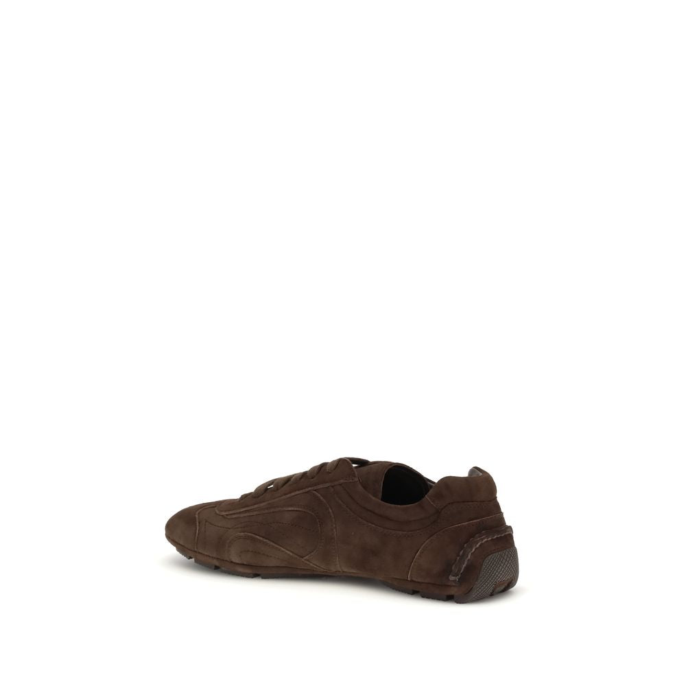 Elevate your style with Prada Brown Calf Leather Bos Taurus Sneakers, where exquisite craftsmanship meets timeless luxury for the discerning individual.