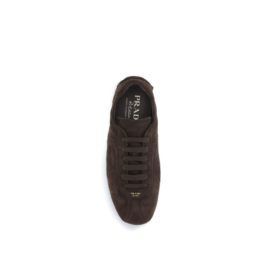 Elevate your style with Prada Brown Calf Leather Bos Taurus Sneakers, where exquisite craftsmanship meets timeless luxury for the discerning individual.