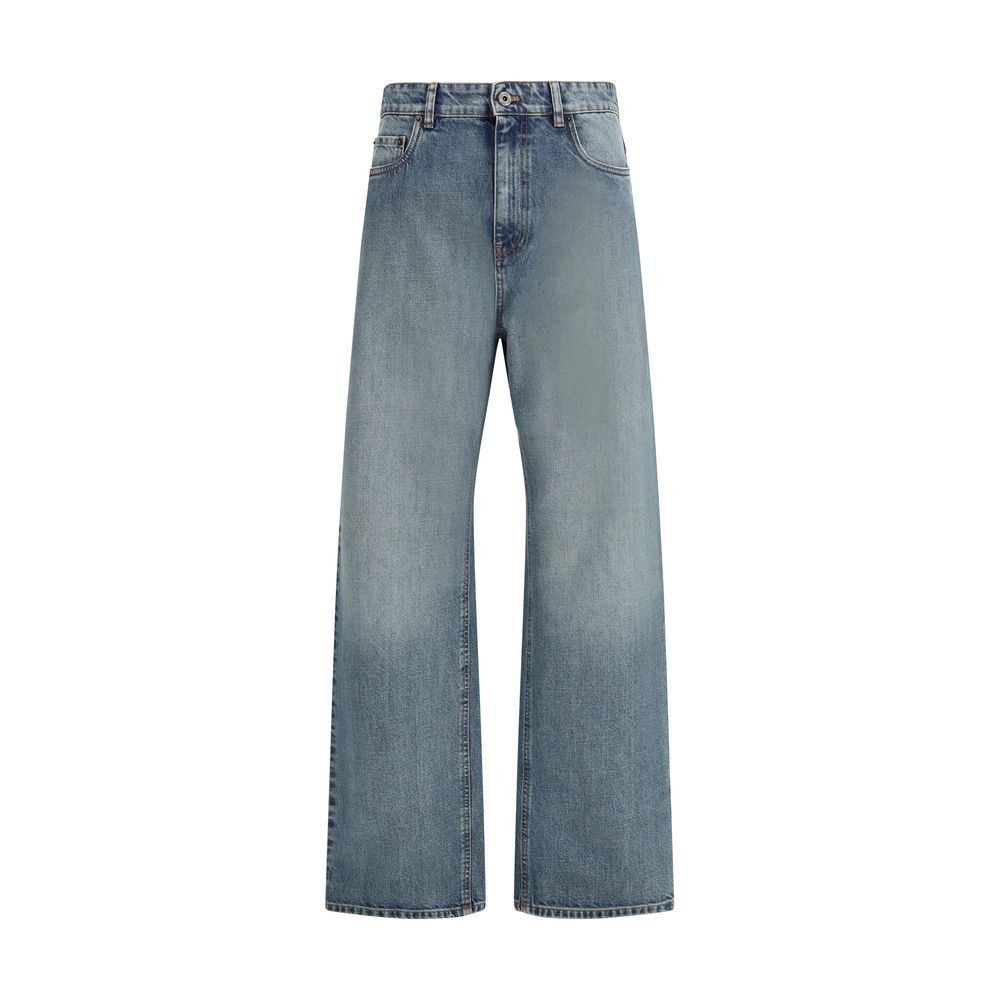Discover the Miu Miu Blue Cotton Straight-Leg Jeans, crafted from sumptuous stone-washed denim for an effortlessly chic look that redefines luxury and elegance.