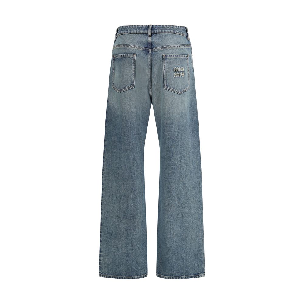 Discover Miu Miu Blue Cotton Straight-Leg Jeans, a luxurious blend of timeless craftsmanship and modern elegance, perfect for the discerning individual.