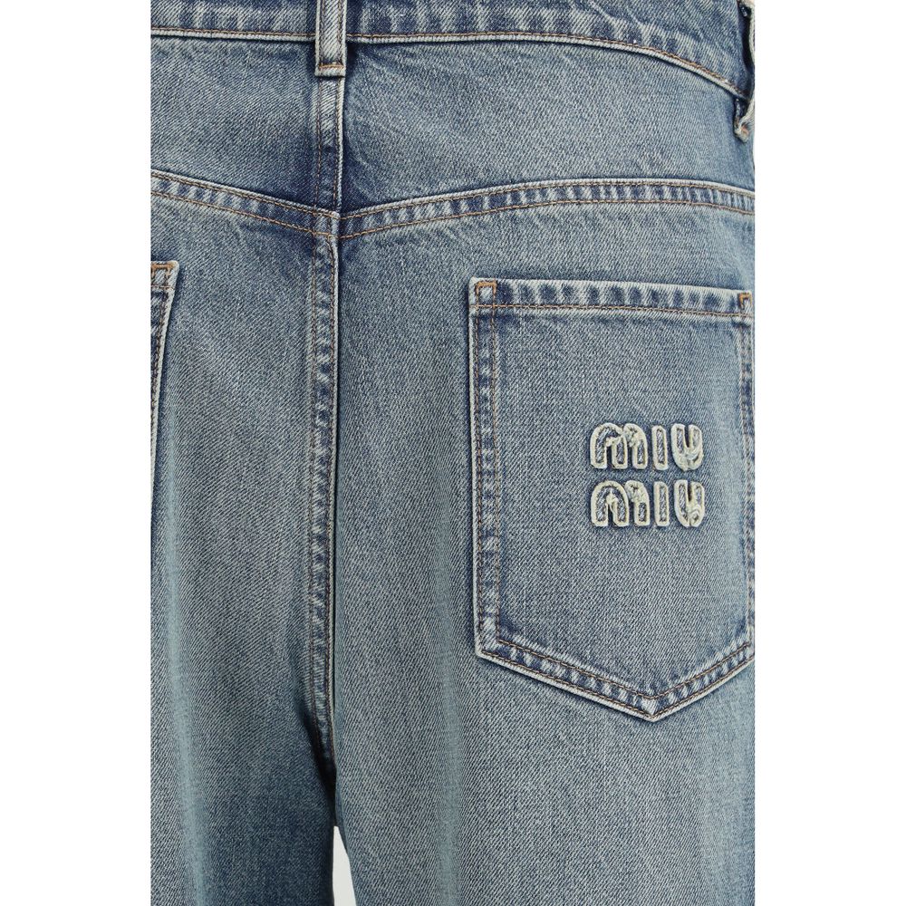 Discover the Miu Miu Blue Cotton Straight-Leg Jeans, a luxurious blend of timeless craftsmanship and modern elegance, perfect for elevating any wardrobe.
