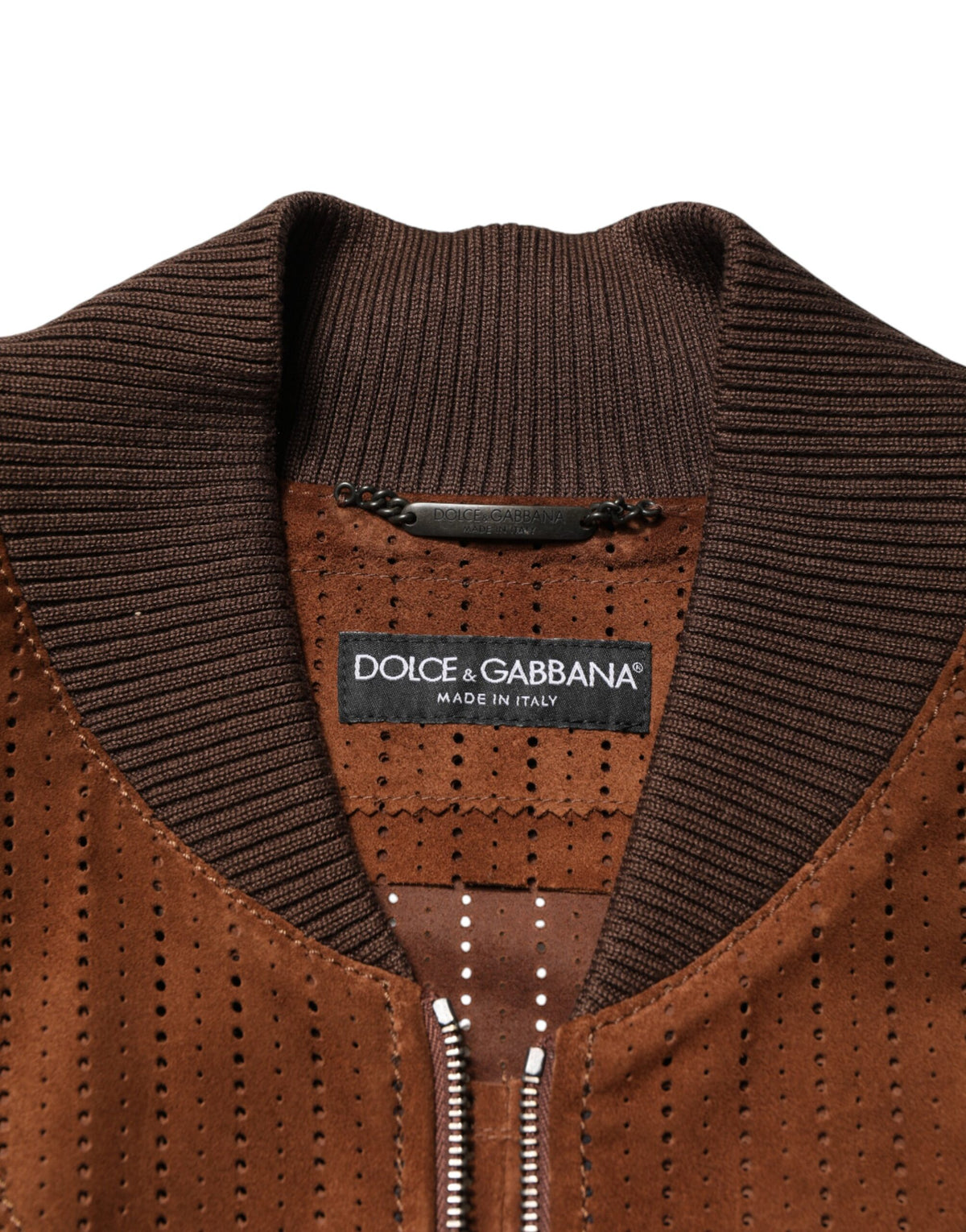 Indulge in the exquisite Dolce & Gabbana Brown Velvet Calfskin Full Zip Biker Jacket, a masterpiece of Italian craftsmanship that elevates your style with luxurious allure.