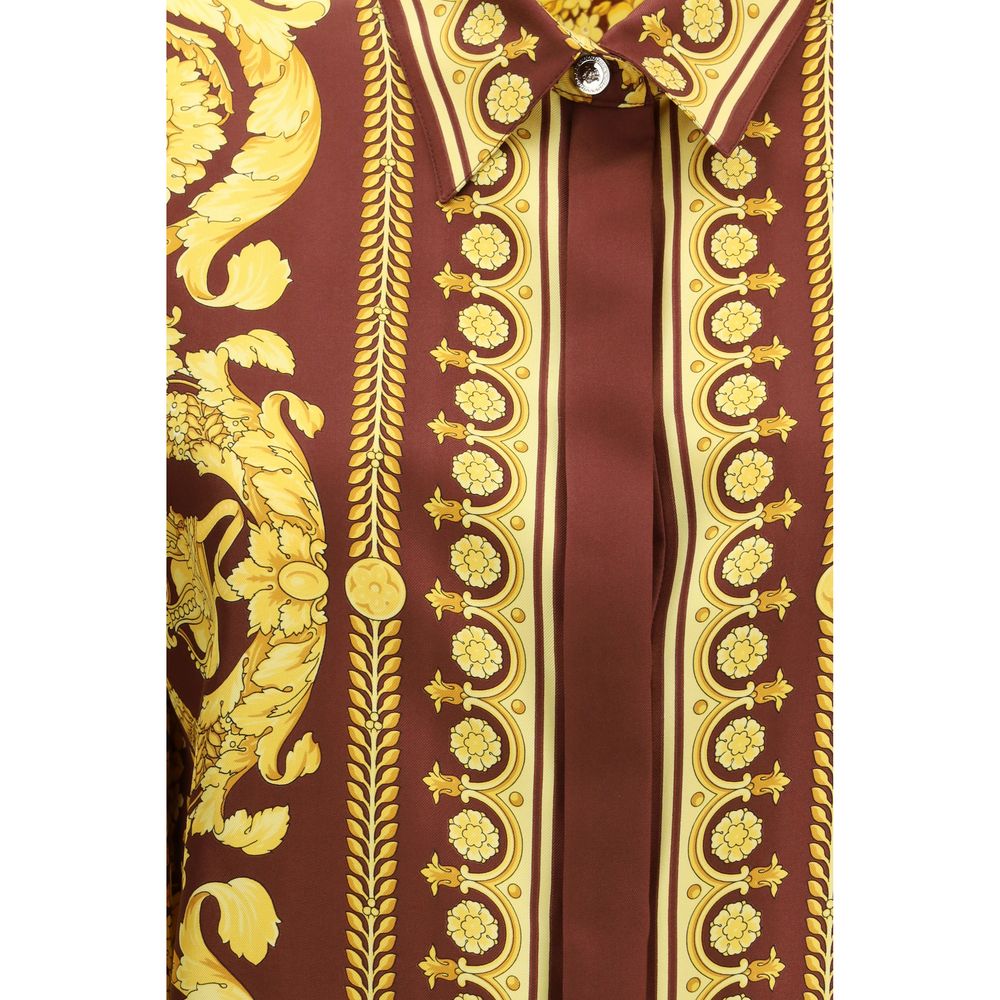 Elevate your style with the Versace Bordeaux Silk Pattern Shirt, a masterpiece of pure silk and Barocco artistry, embodying luxury and timeless elegance.