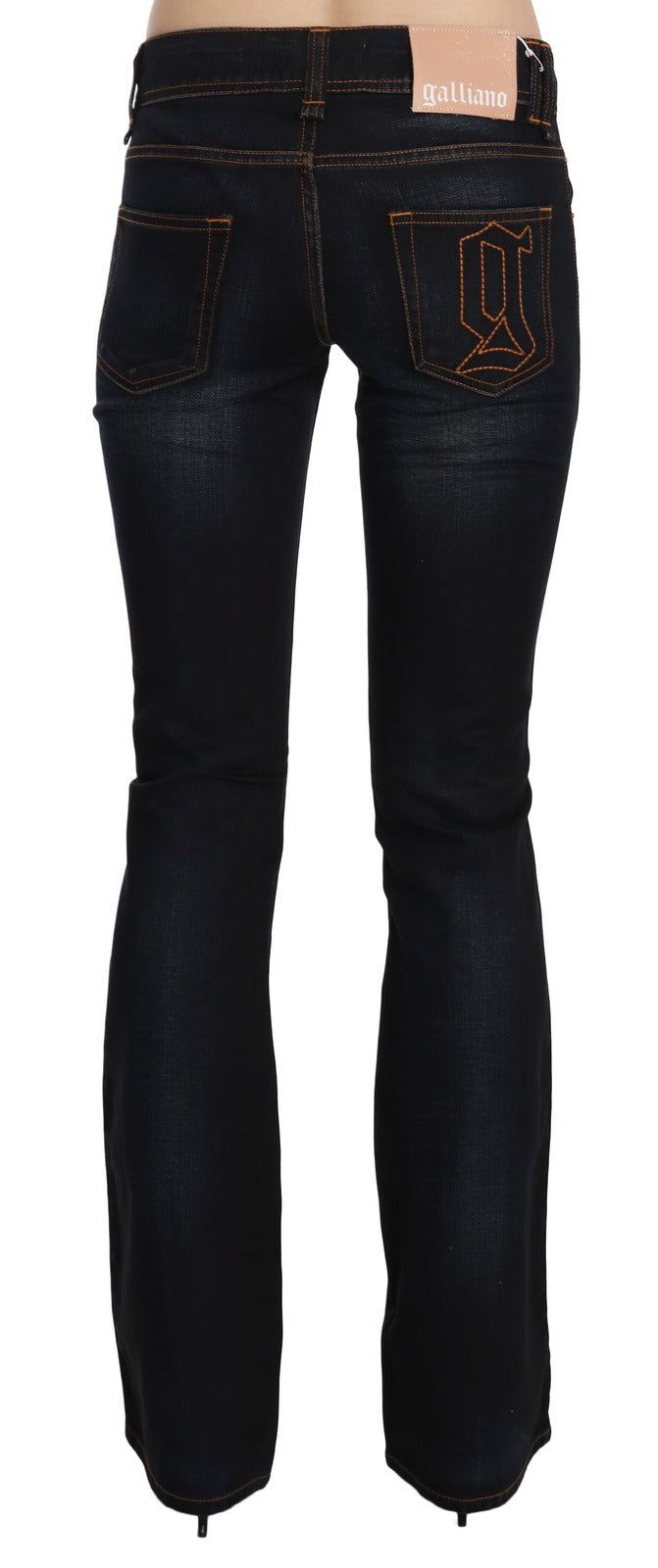 Experience the exquisite allure of John Galliano's blue washed boot cut jeans, where impeccable craftsmanship meets timeless elegance, perfect for the discerning fashion connoisseur.