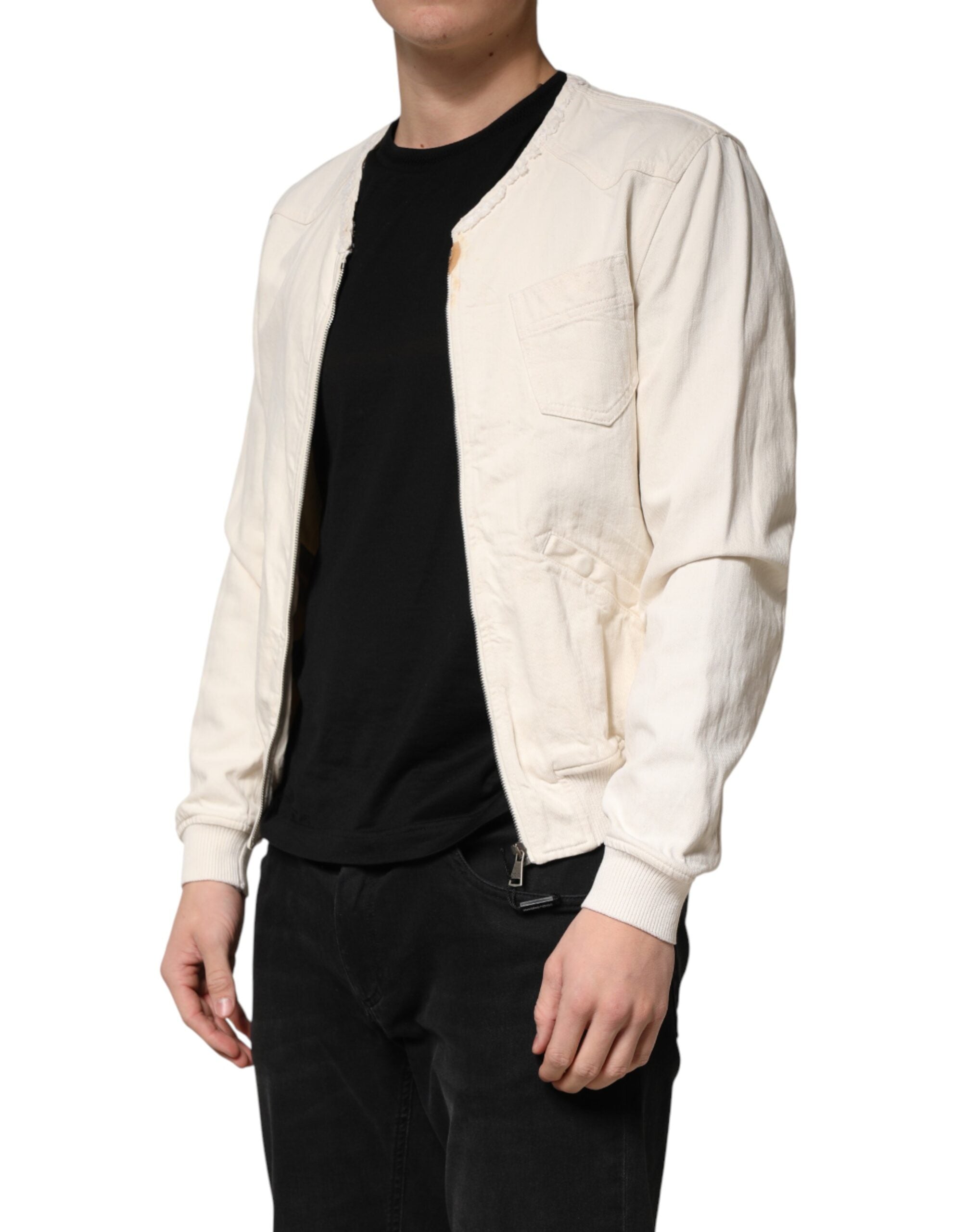 Discover the Dolce & Gabbana Off White Cotton Full Zip Denim Blouson Jacket, a testament to Italian craftsmanship that elevates your style with luxurious elegance.