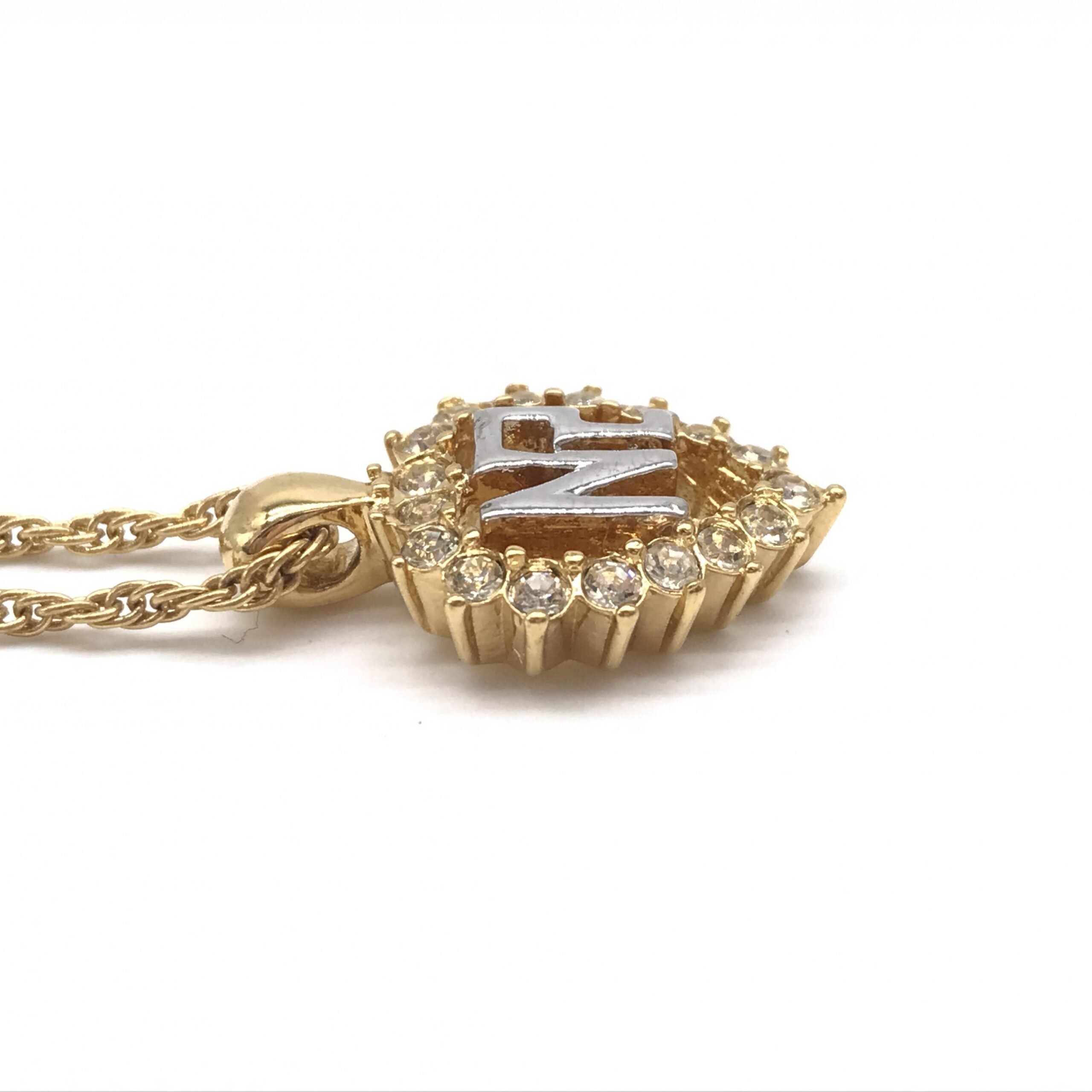 Nina Ricci Gold Tone Pendant Necklace With Heart Design