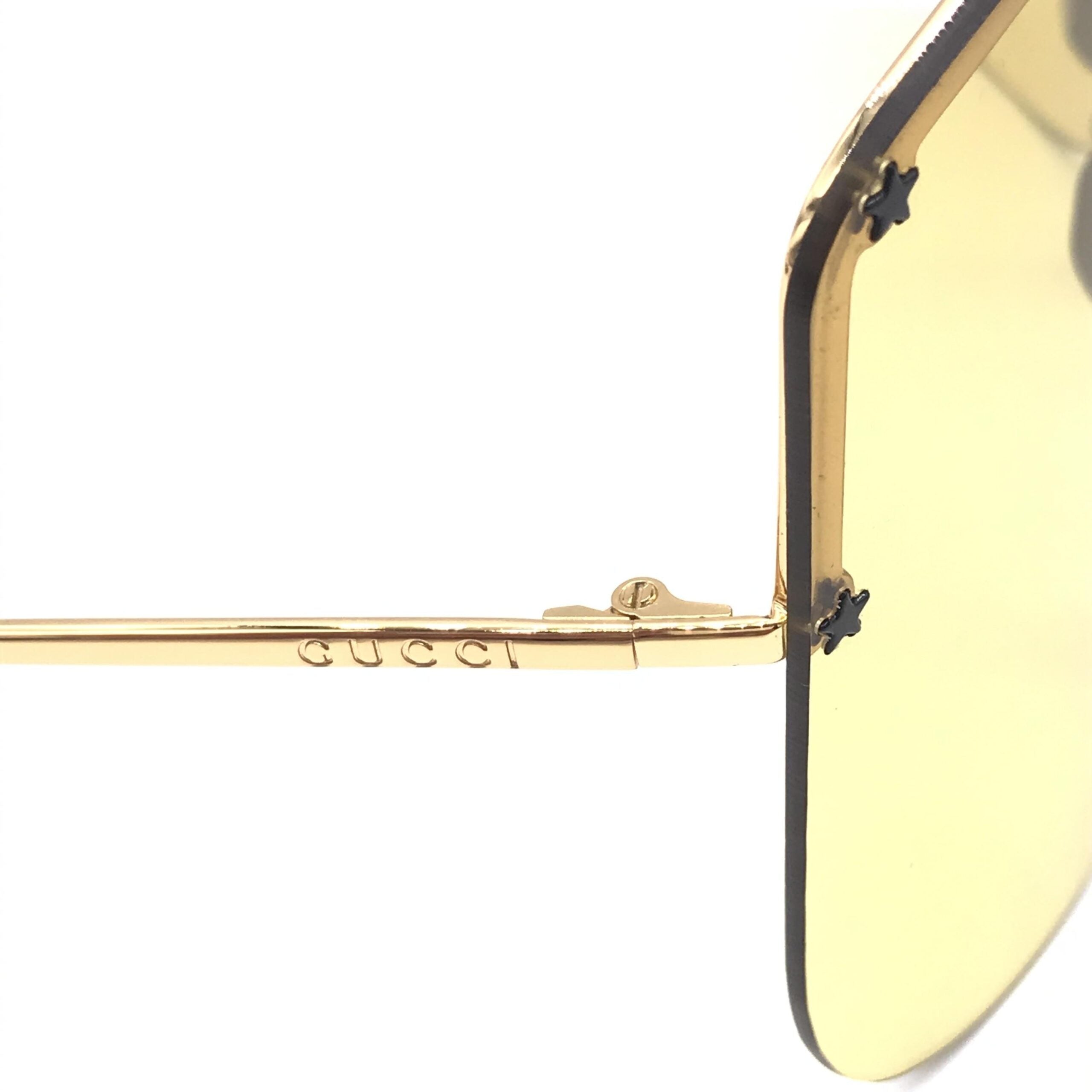 Gucci Gold Shield Sunglasses With Stud Details