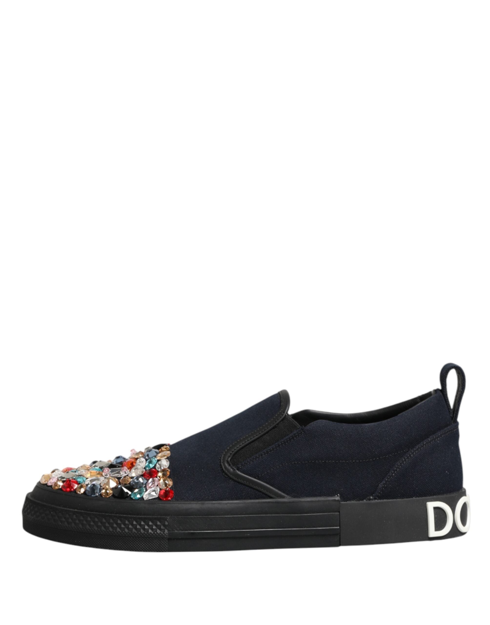 Elevate your style with Dolce & Gabbana's Blue Canvas Embellished Slip On Sneakers, where Italian craftsmanship meets opulent design, embodying timeless elegance for discerning tastes.