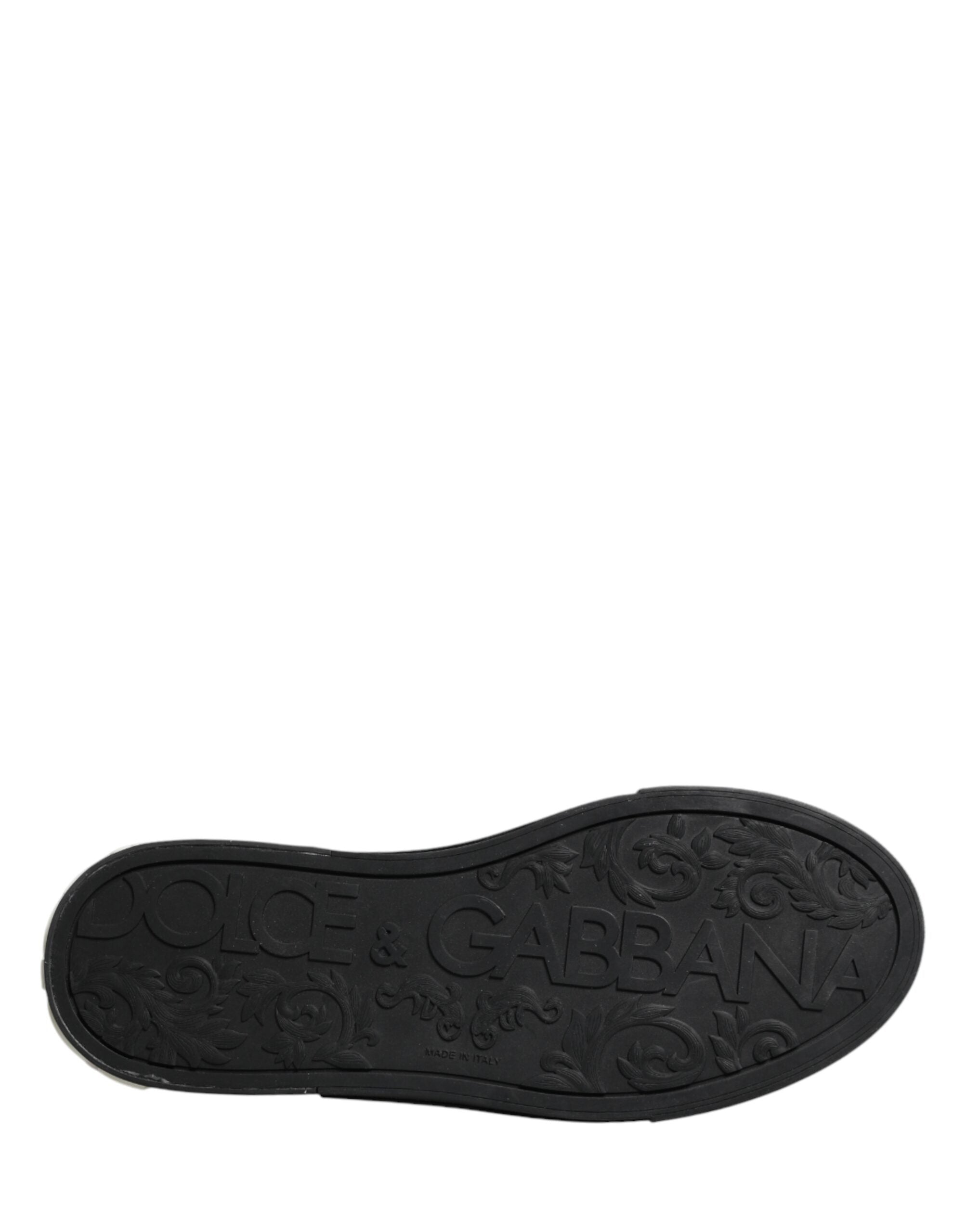 Elevate your style with Dolce & Gabbana's Blue Canvas Embellished Slip On Sneakers, where Italian craftsmanship meets opulent design for the discerning fashion lover.