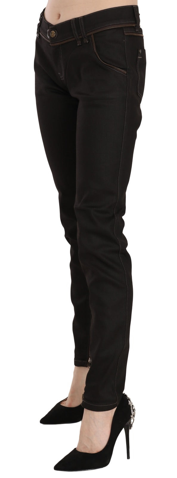 Elevate your wardrobe with John Galliano's Cotton Black Mid Waist Skinny Denim Jeans, where exquisite craftsmanship meets timeless luxury for the discerning individual.