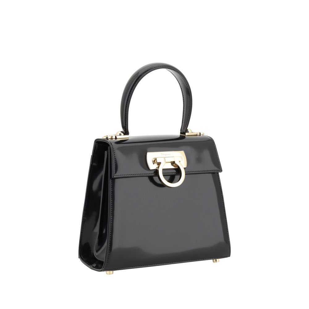 Discover the Ferragamo Black Calf Leather Bos Taurus Handbag, a masterpiece of exquisite craftsmanship and timeless elegance, perfect for the discerning individual.