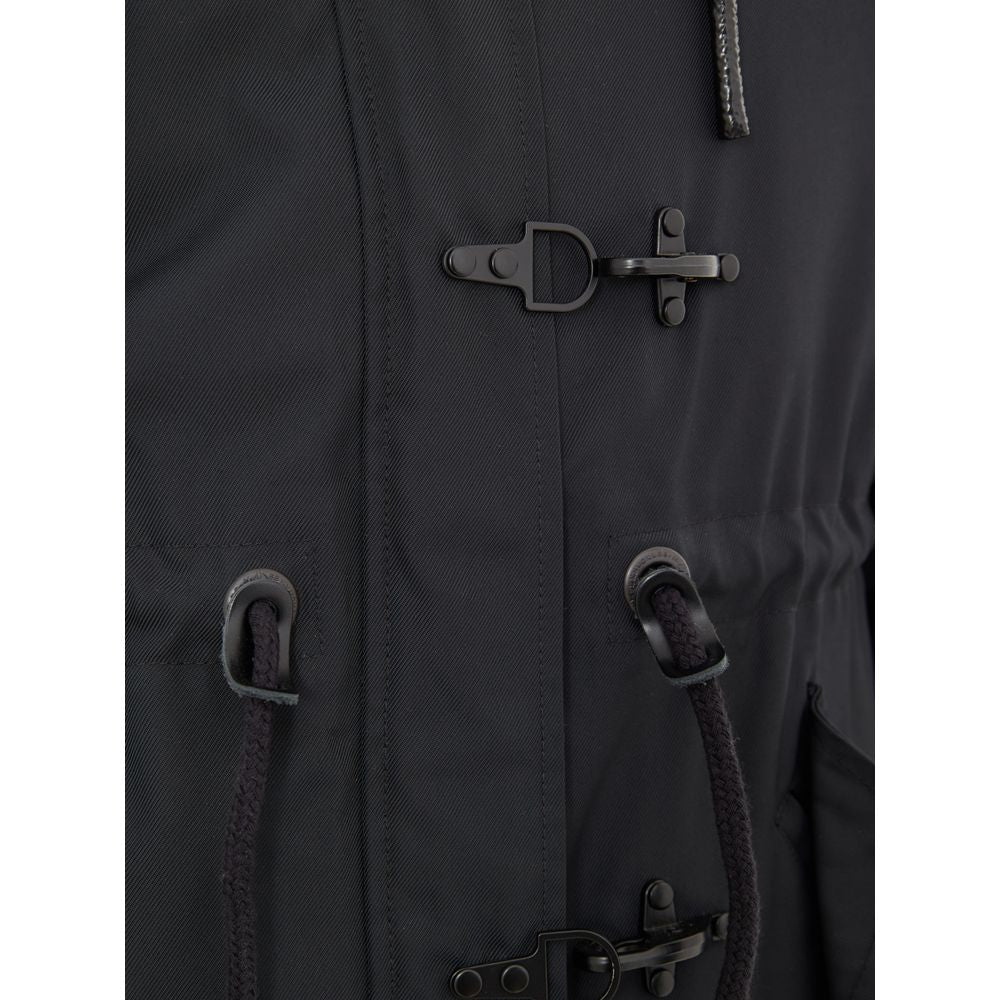 Indulge in the Moose Knuckles Blue Nylon Parka, a luxurious blend of nylon and cotton, merging exquisite craftsmanship with timeless elegance for the discerning individual.