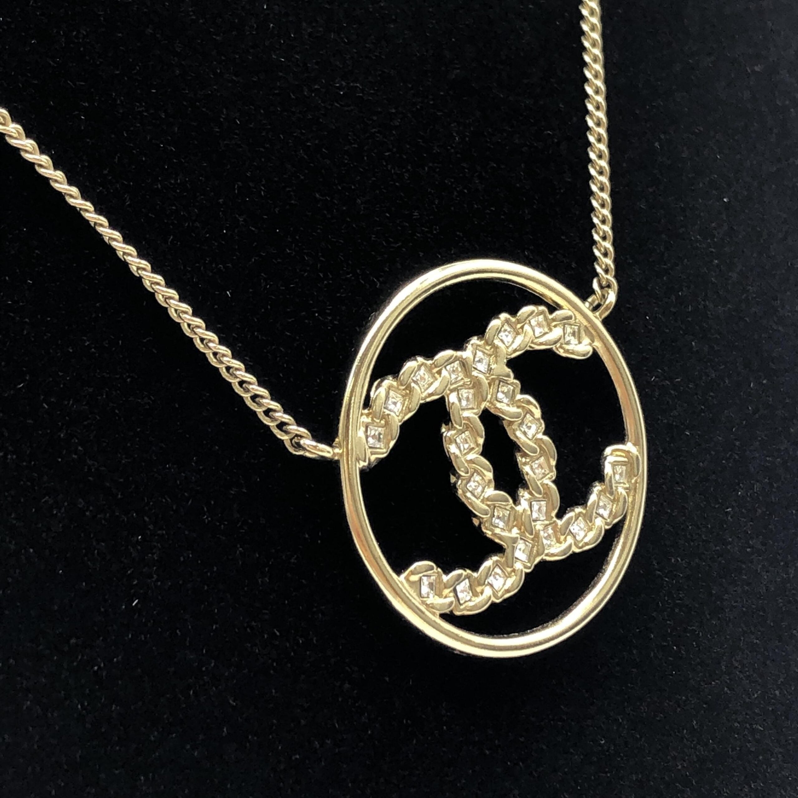 Chanel Gold Tone CC Circle Pendant Necklace - Artisanal Elegance