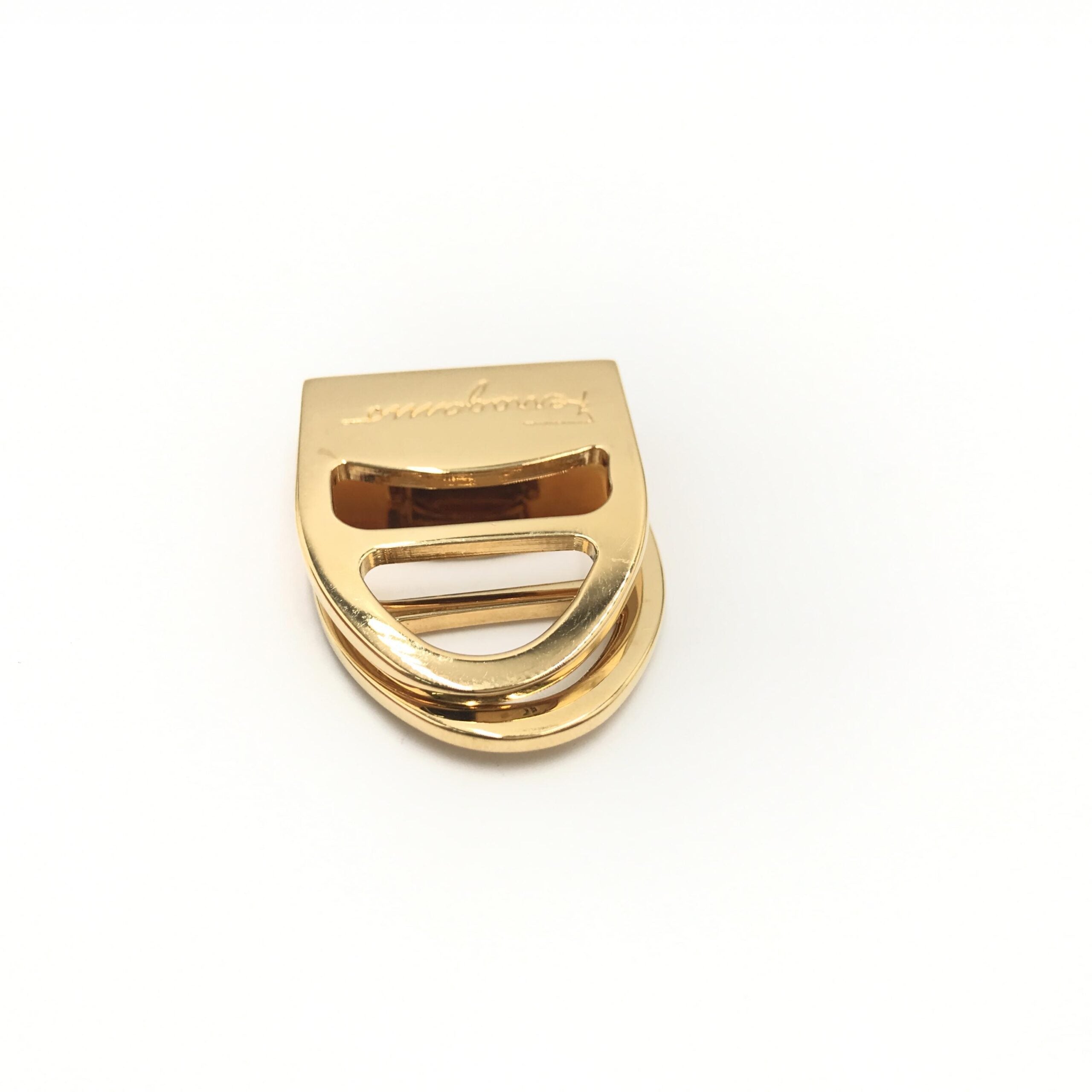 Elevate your style with the Salvatore Ferragamo Vara Metal Scarf Ring, a masterpiece of Italian craftsmanship that transforms any ensemble into a statement of luxury.