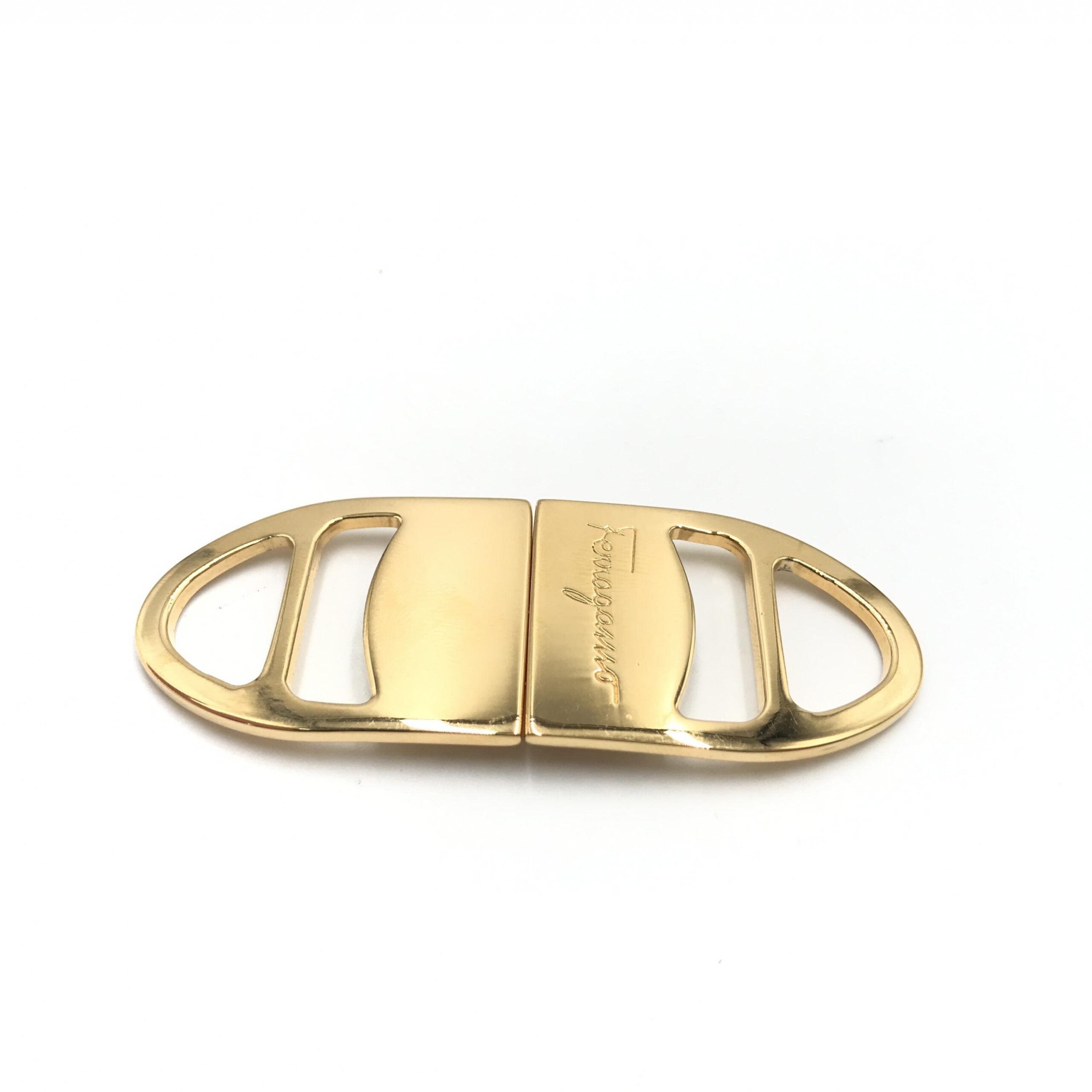 Elevate your style with the Salvatore Ferragamo Vara Metal Scarf Ring, a timeless piece that embodies luxury and sophistication, perfect for any elegant ensemble.