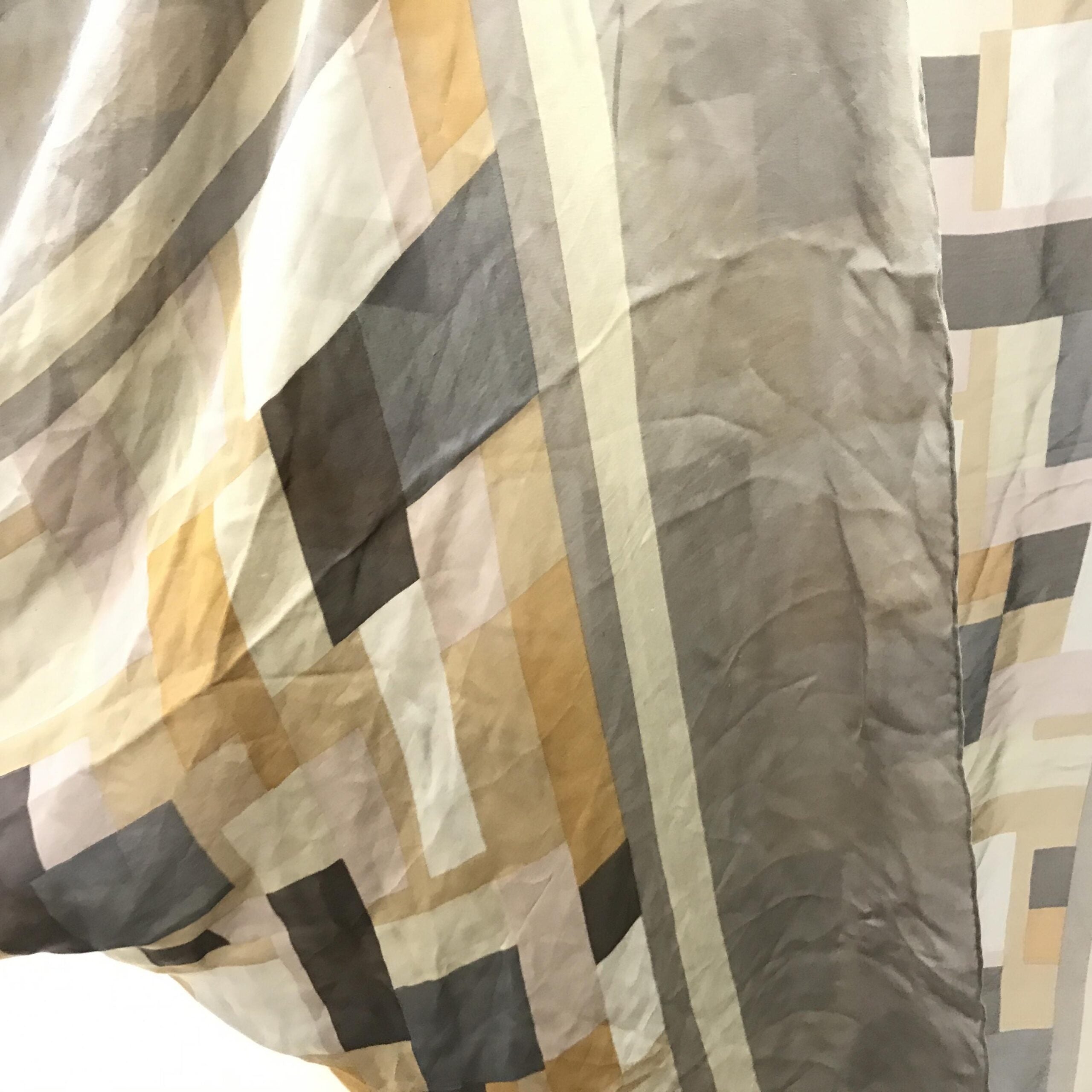 Indulge in the exquisite Salvatore Ferragamo Silk Scarf, a timeless accessory crafted from 100% silk, embodying luxury and elegance for the discerning individual.